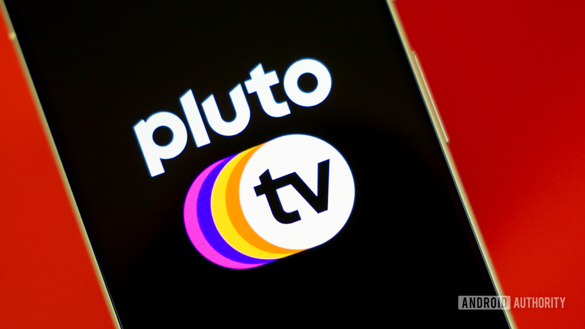 Stock photo of Pluto TV logo on phone 2