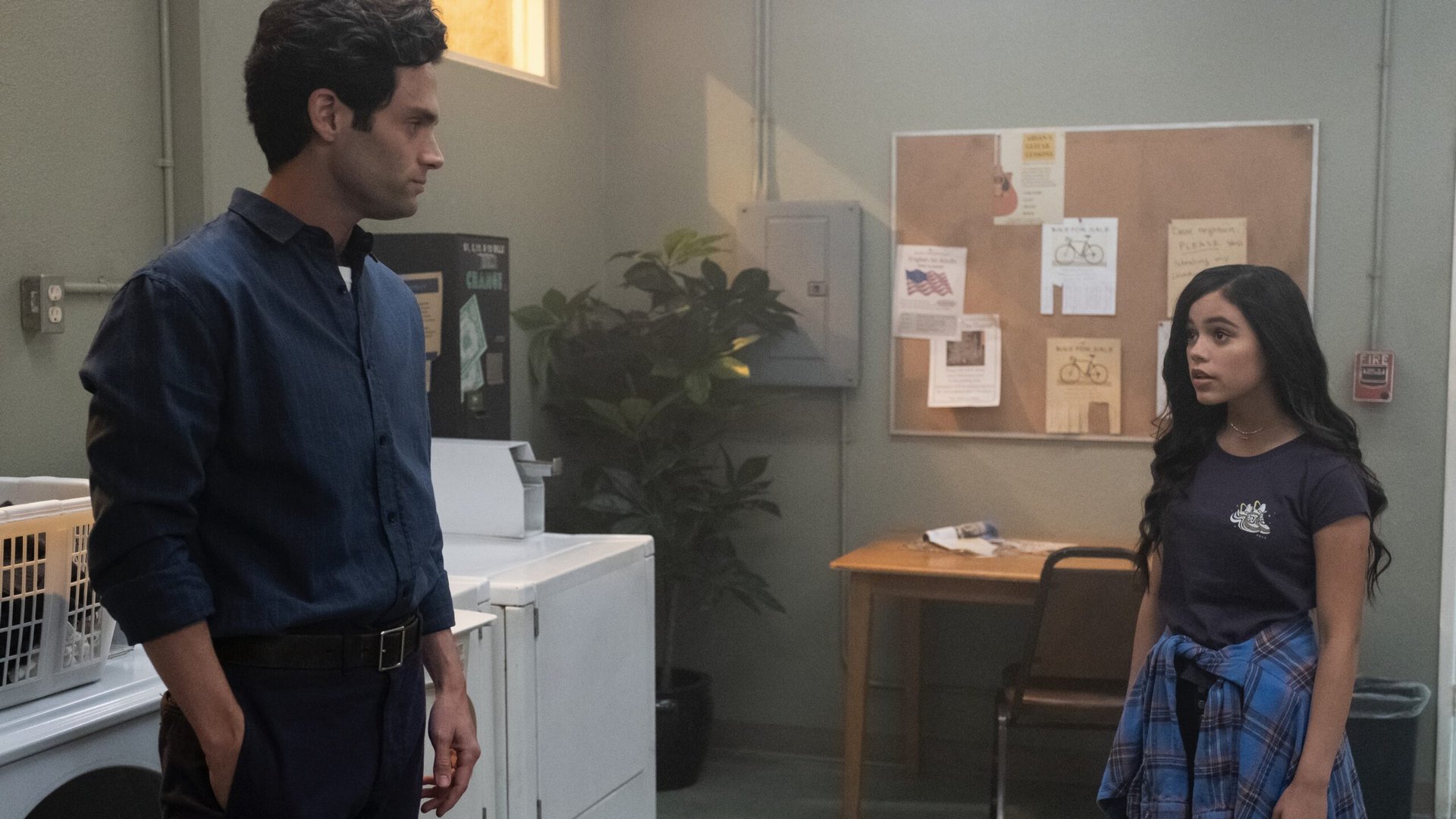 Penn Badgley and Jenna Ortega in a laundry room in You - jenna ortega movies and tv shows