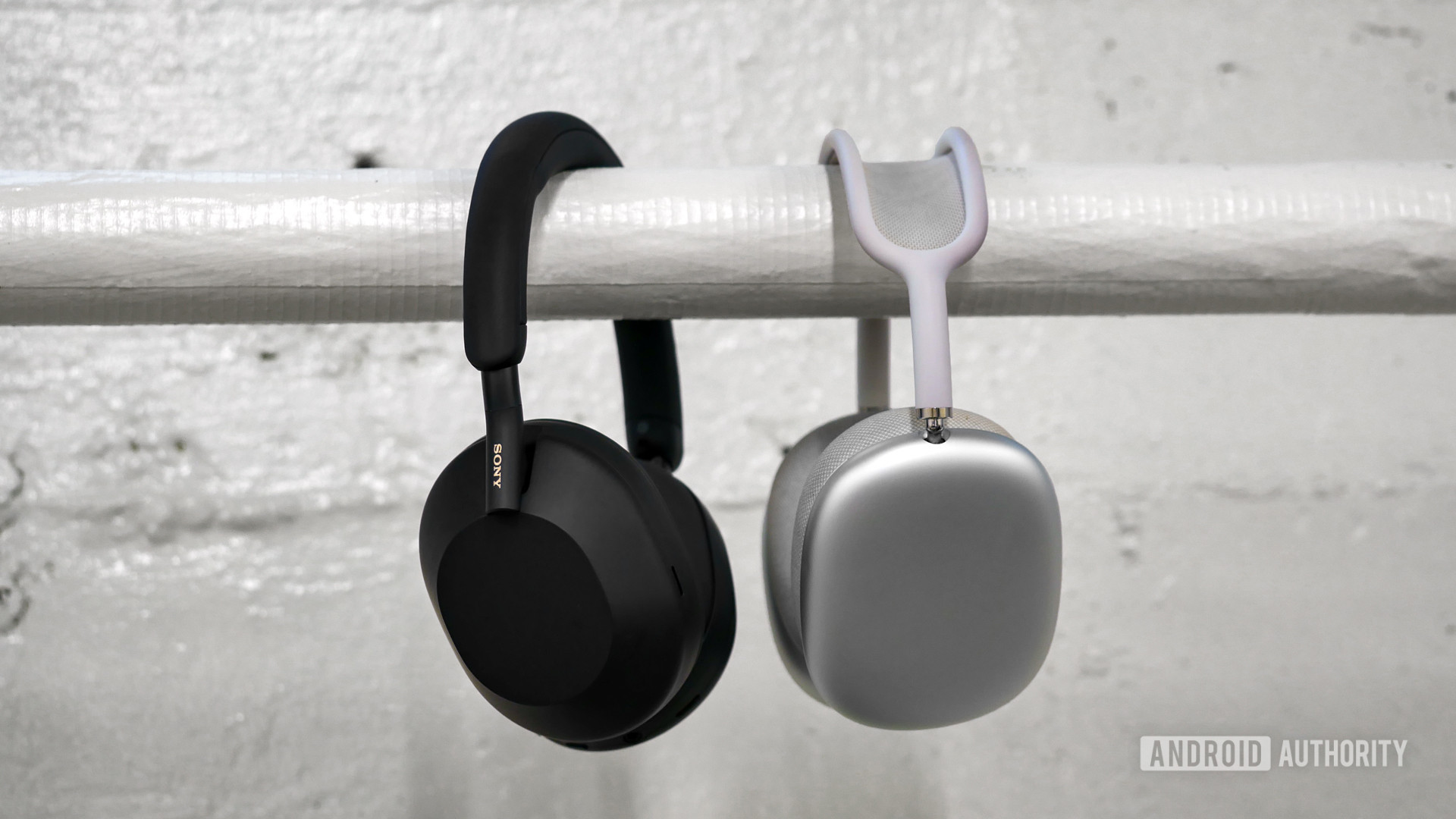 The Sony WH-1000xm5 next to the Apple AirPods Max.