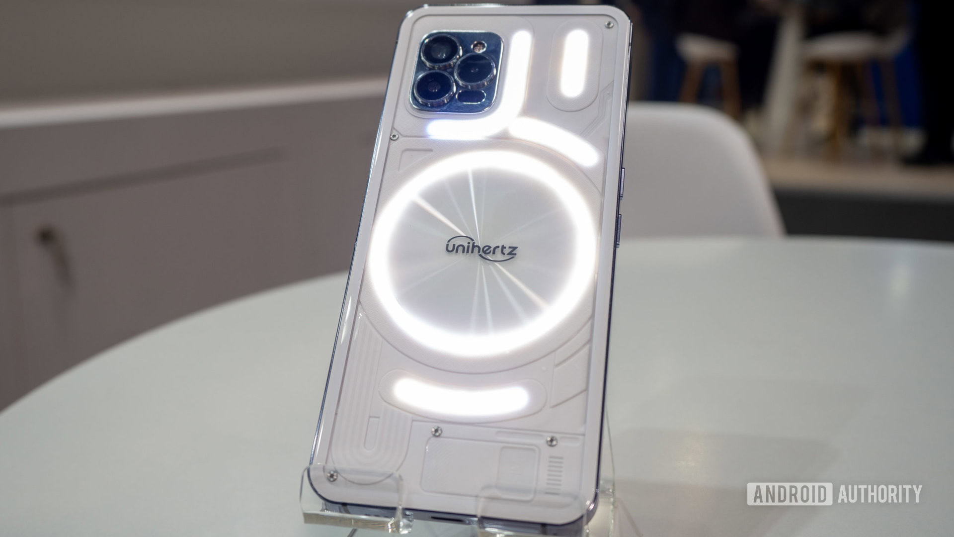 White Unihertz Luna phone, from the back, with white lights