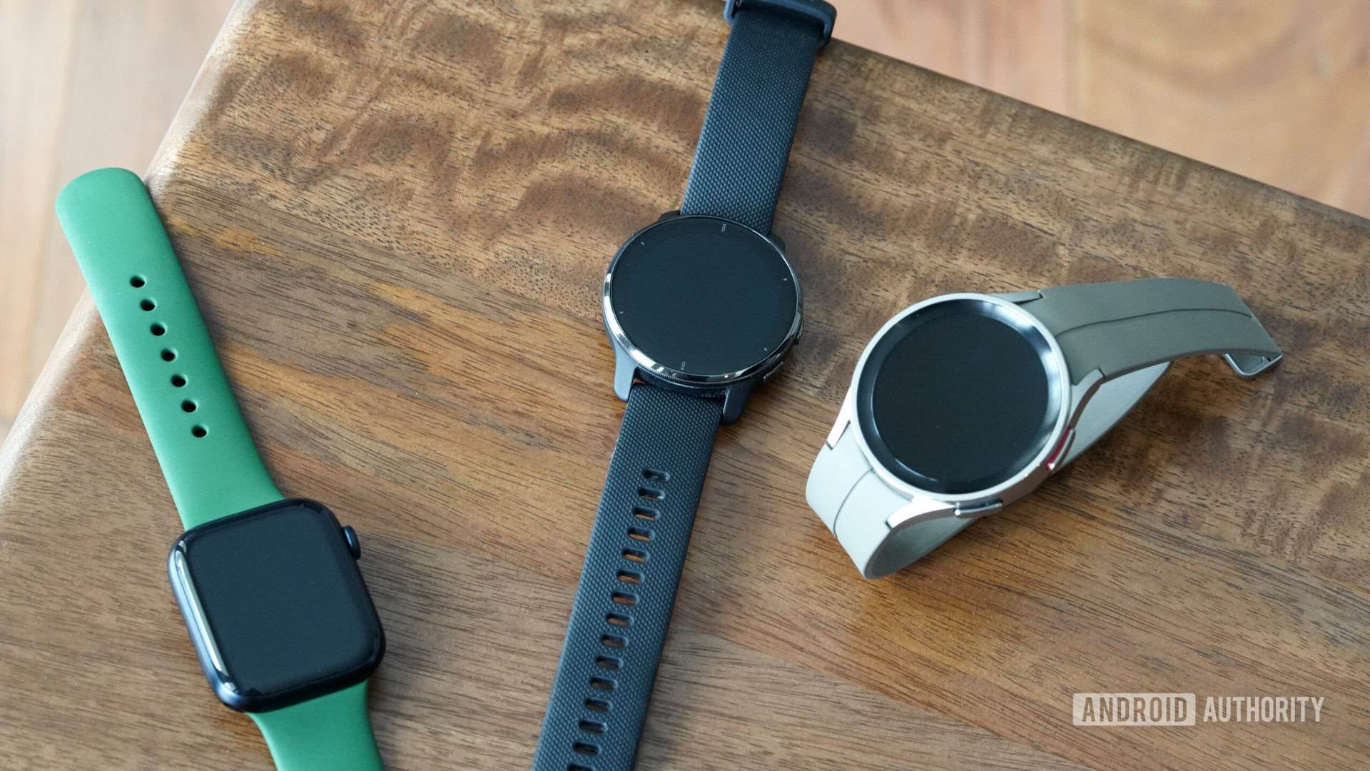 A collection of leading wearables rests on a bench. 