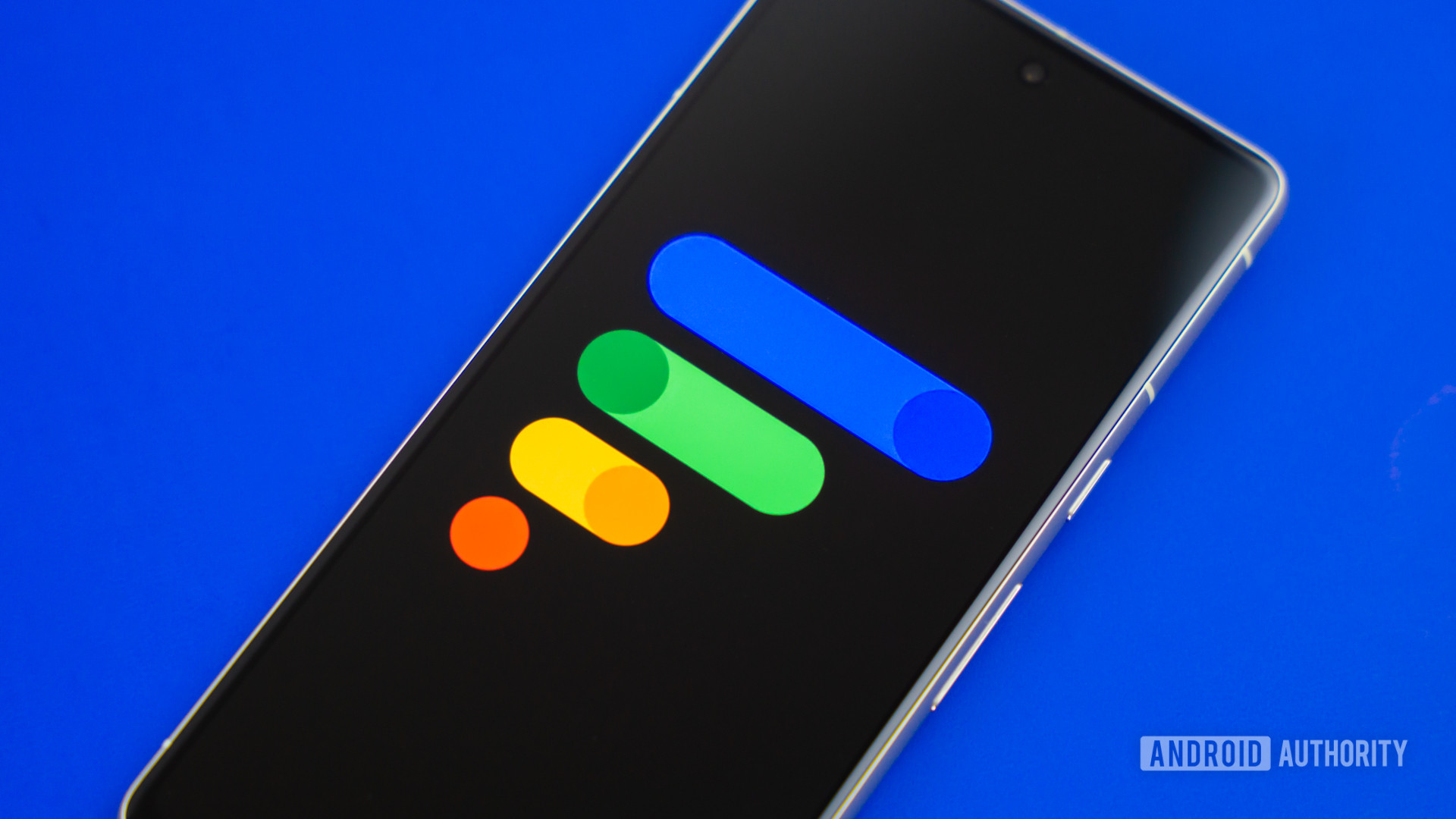 Google Fi Wireless logo on smarpthone with colored background Stock photo 2