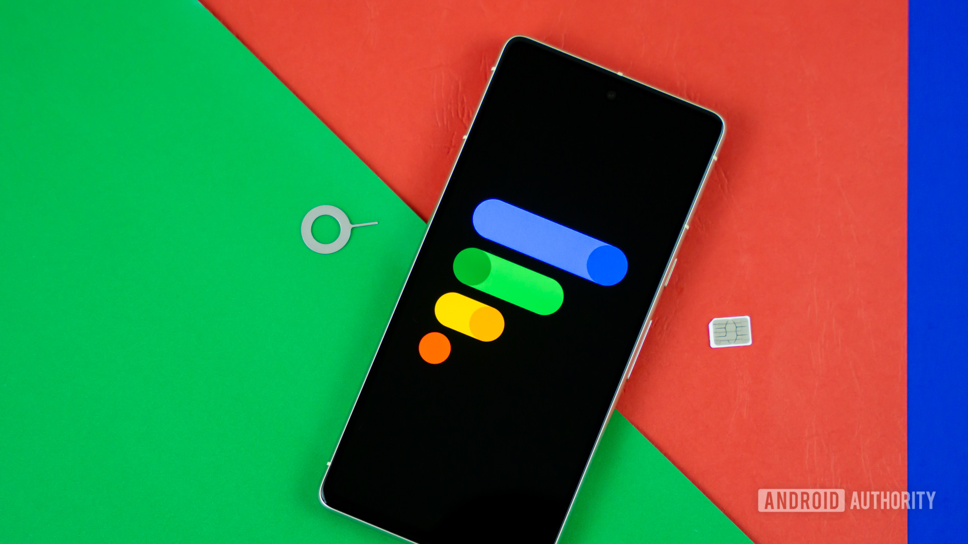Google Fi Wireless logo on smartphone with SIM card and SIM ejector next to it Stock photo 3