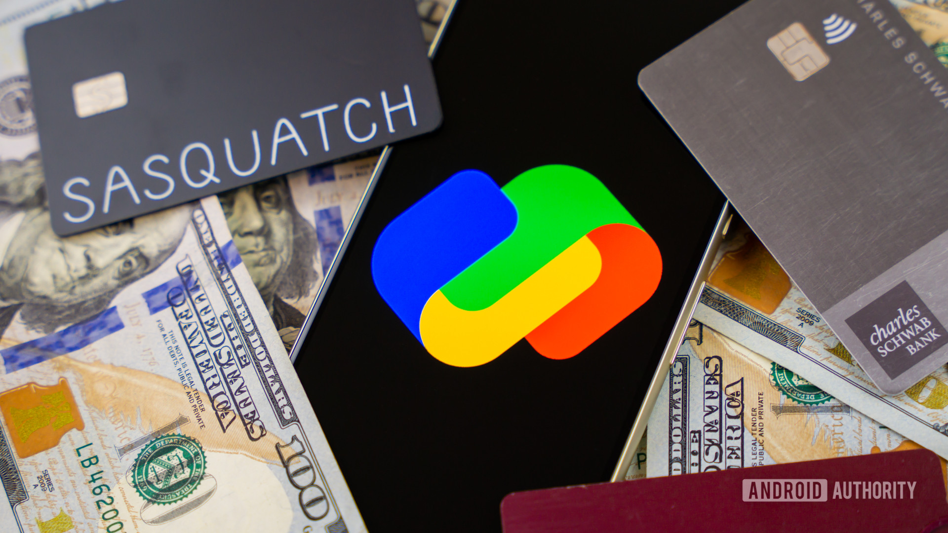 Google Pay logo on smartphone next to money and cards Stock photo 3