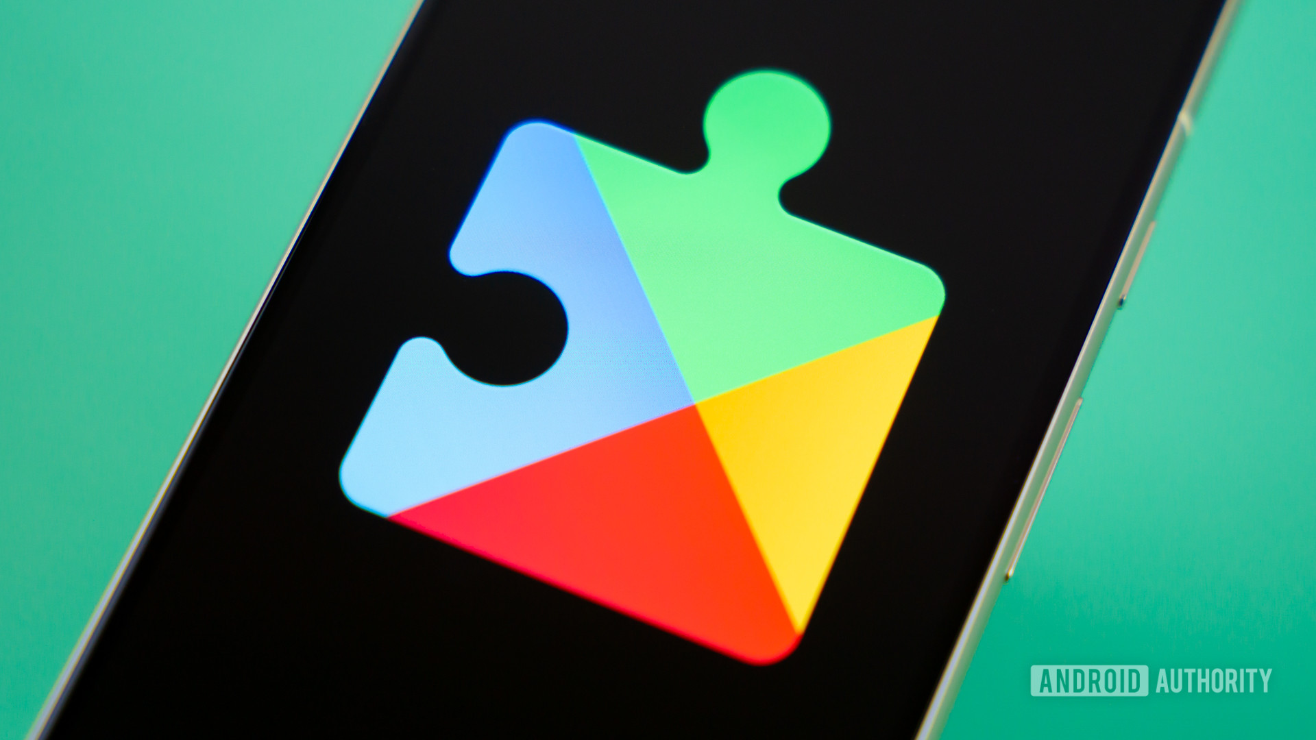 Google Play Services logo on smartphone Stock photo 1