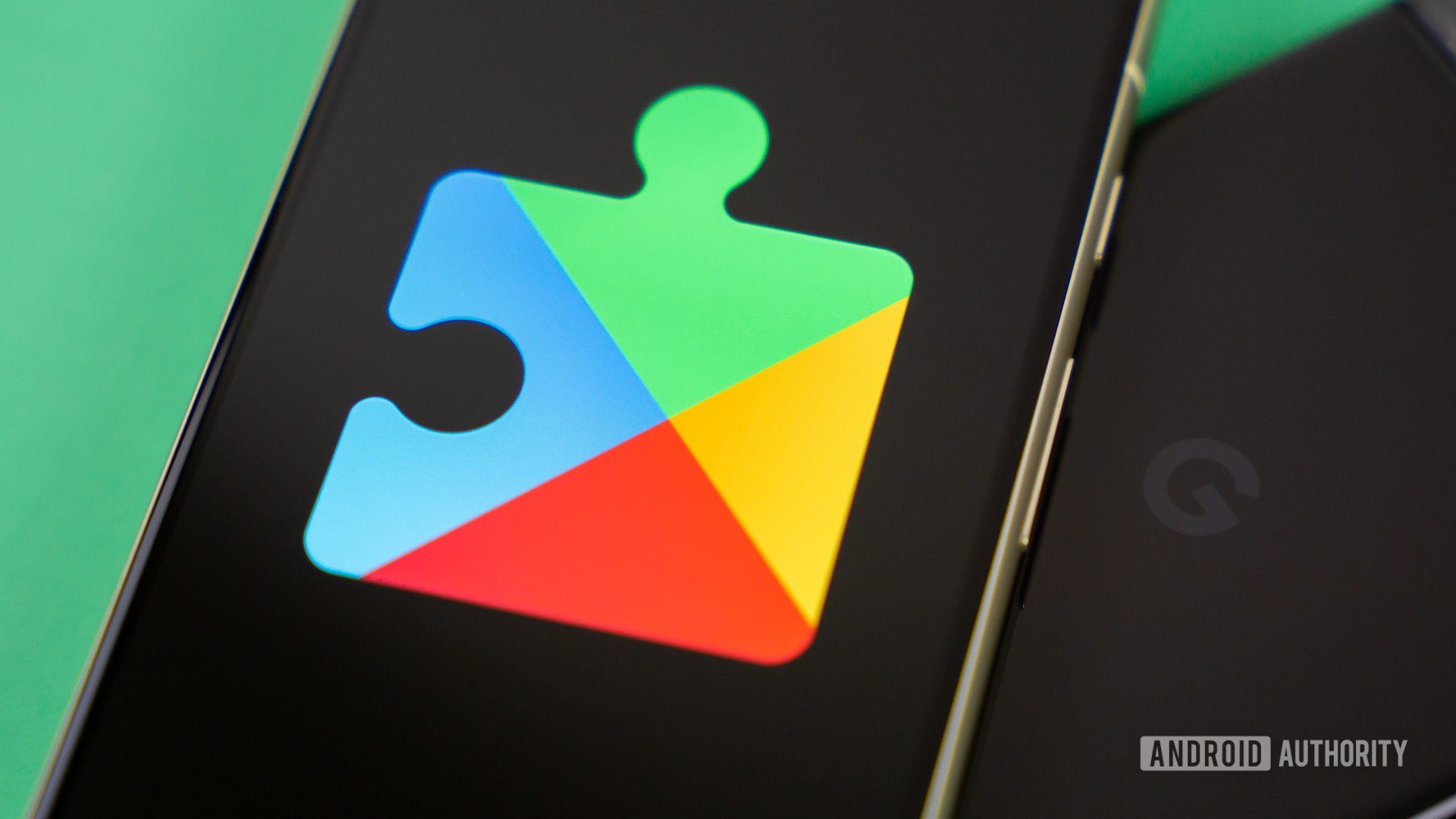 Google Play Services logo on smartphone Stock photo 4