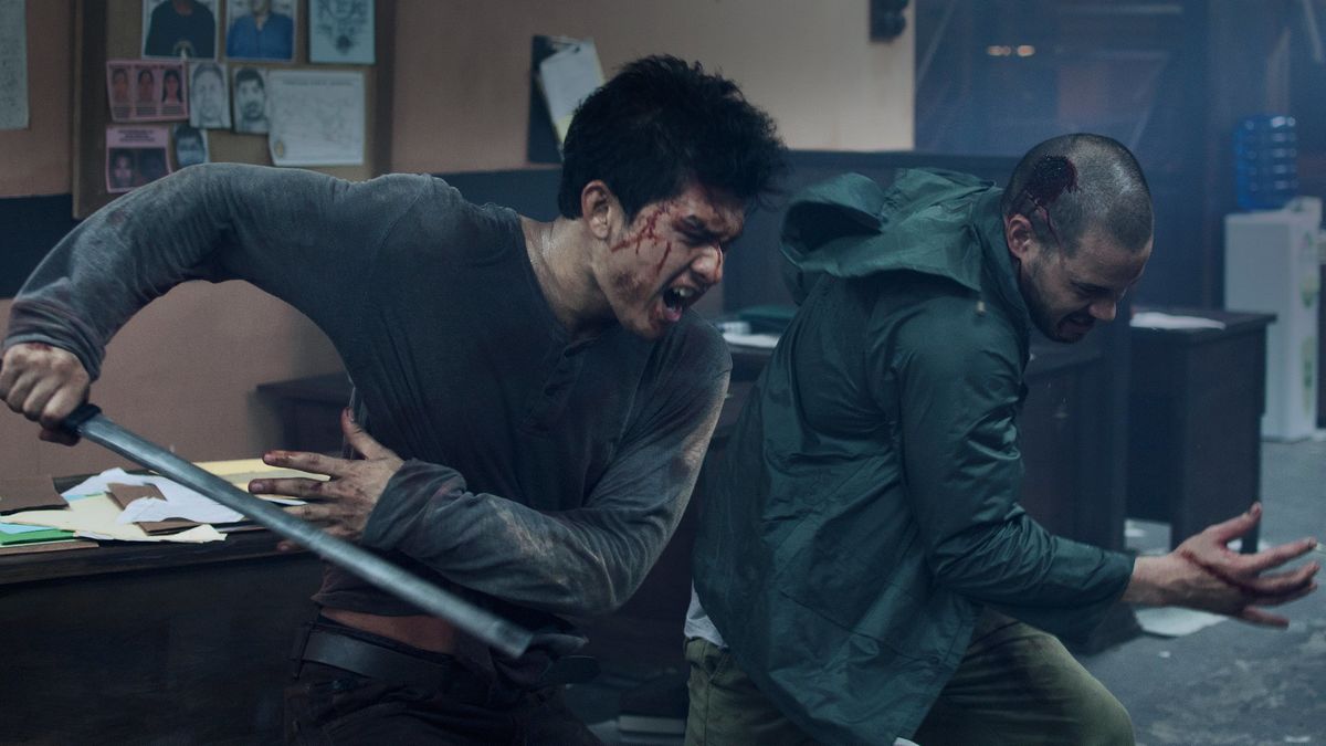 Two men fighting in Headshot - best gangster movies on Netflix