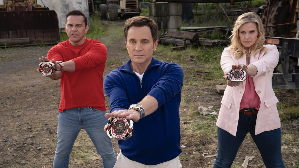 Three Power Rangers hold out their medallions in Mighty Morphin Power Rangers: Once and Always