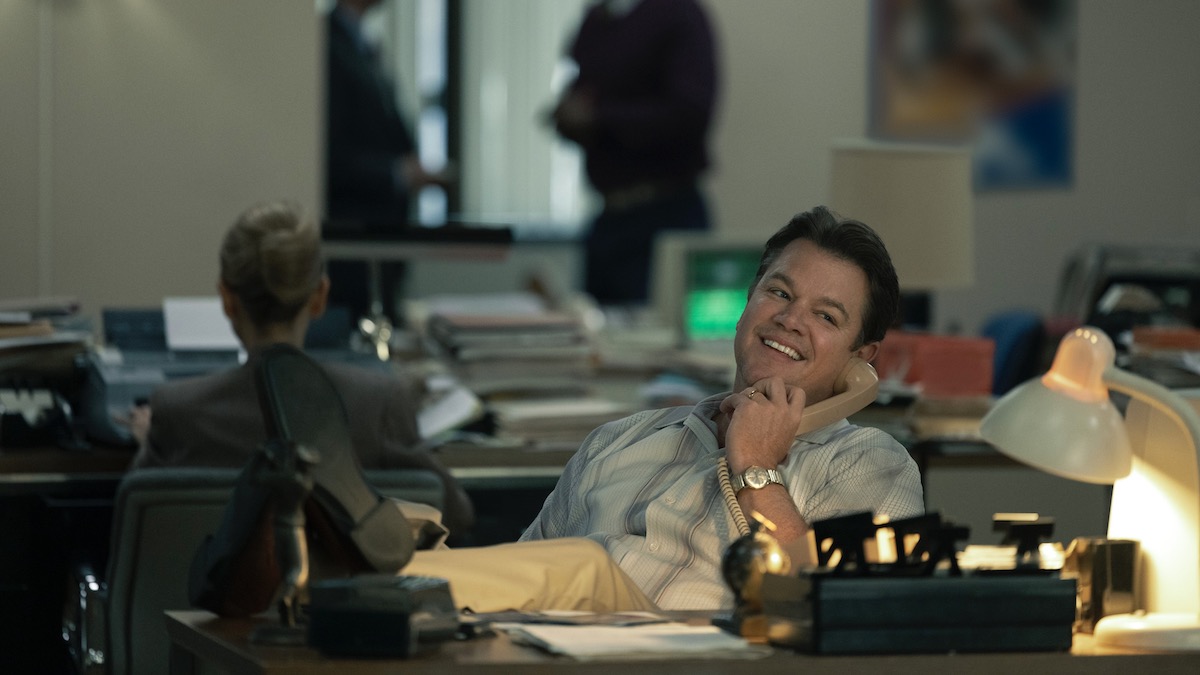 Matt Damon as Sonny Vaccaro sitting at a desk and holding a phone to his ear in Air - best new streaming movies