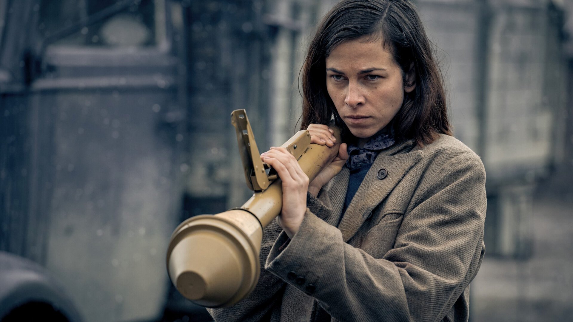 A woman holds a rocket launcher in Blood and Gold - best new streaming movies
