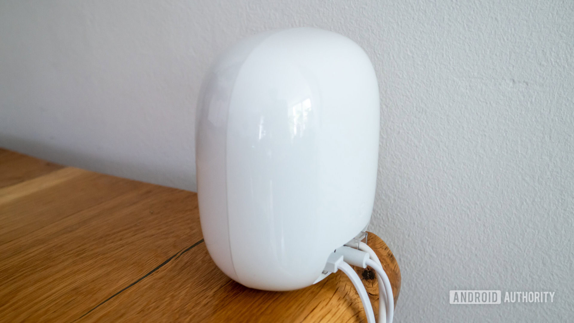 Google Nest Wi Fi Pro rear side view on table