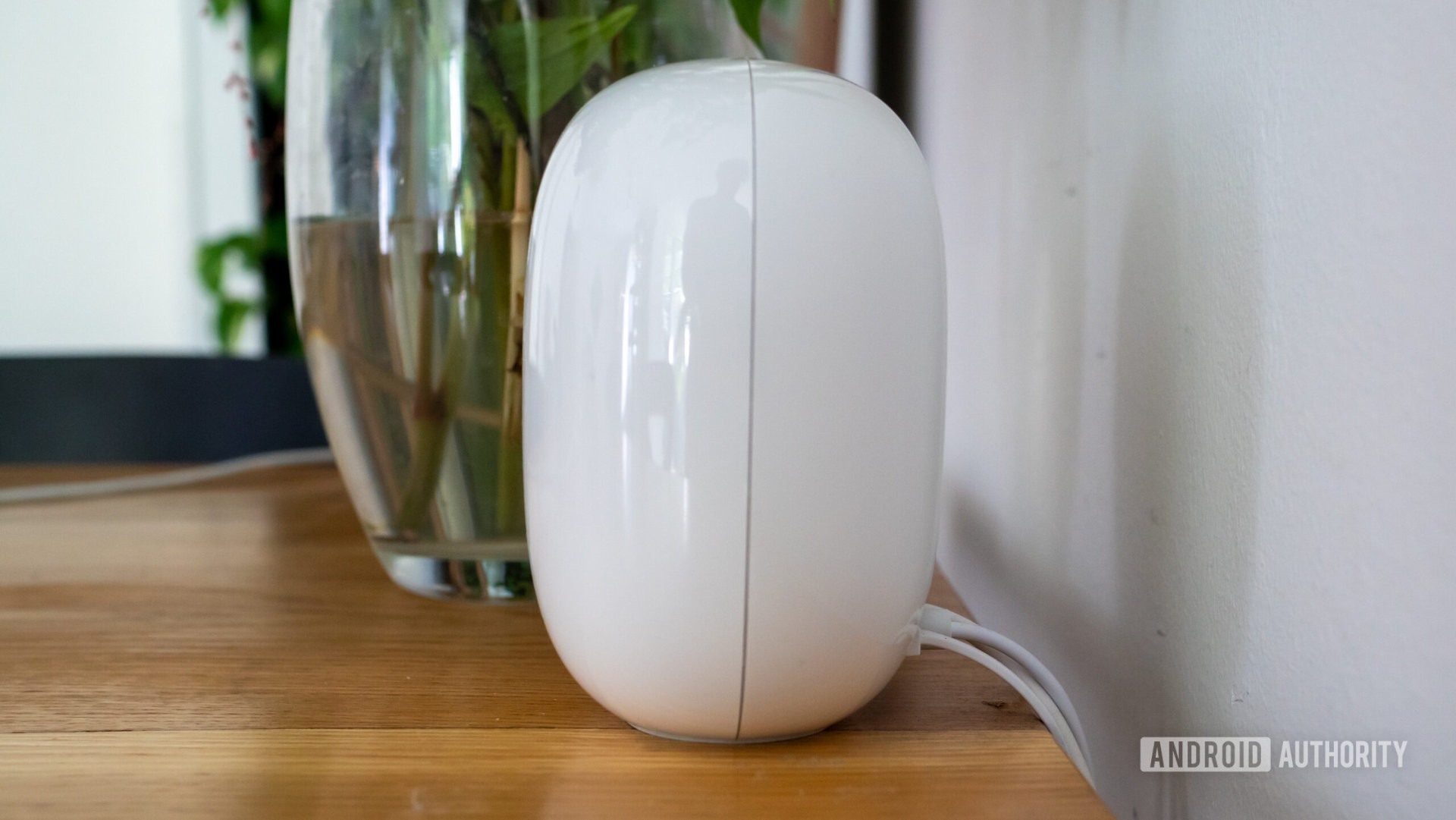 Google Nest Wi Fi Pro router side view on table