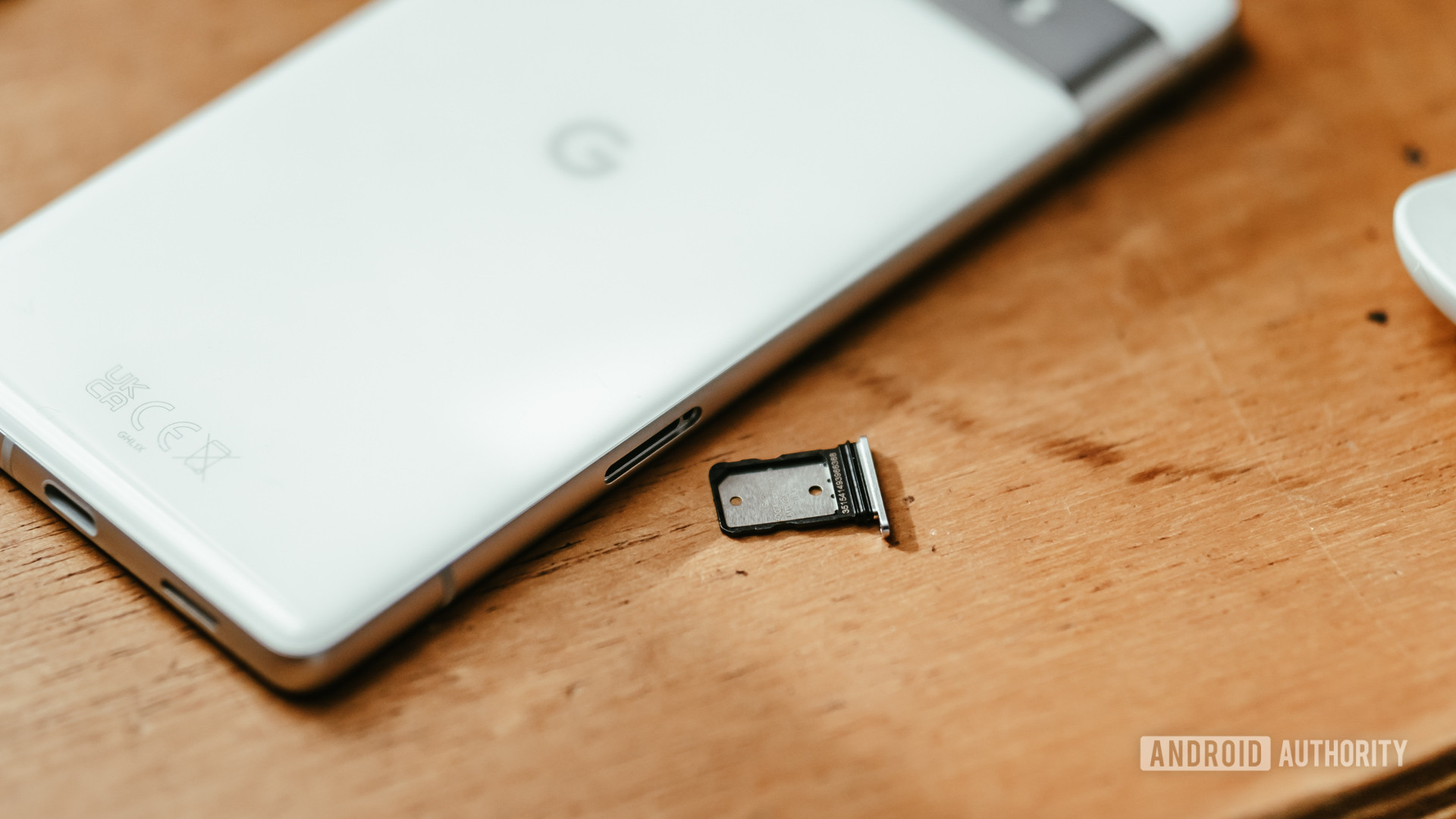 Google Pixel 7a SIM tray and tool