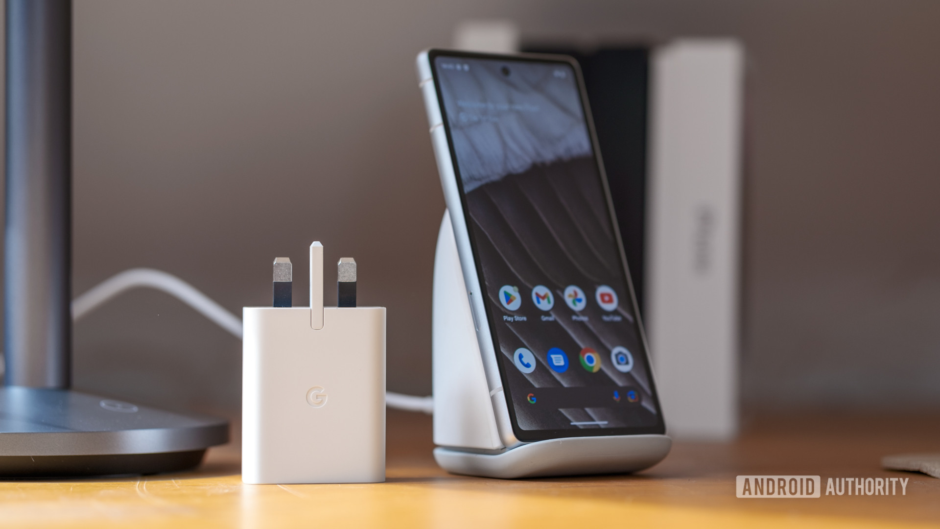 Google Pixel 7a charging plug and wireless dock