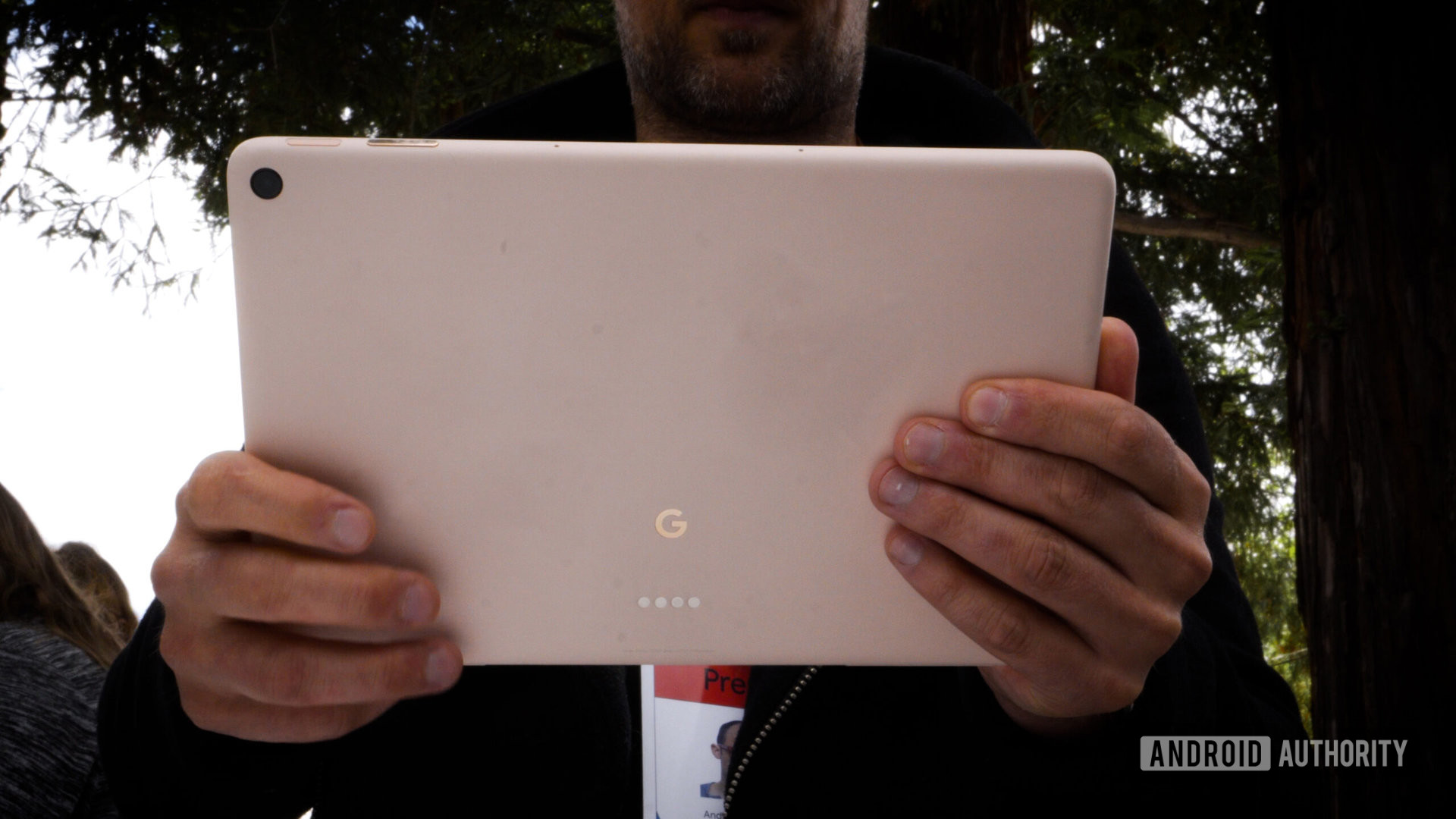 Google Pixel Tablet Holding Back Logo
