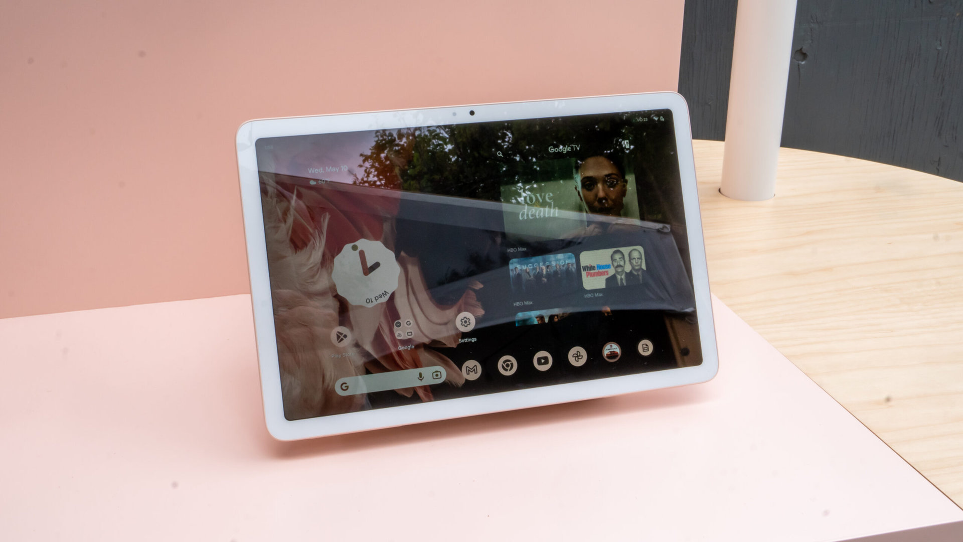 Google Pixel Tablet on dock showing home screen
