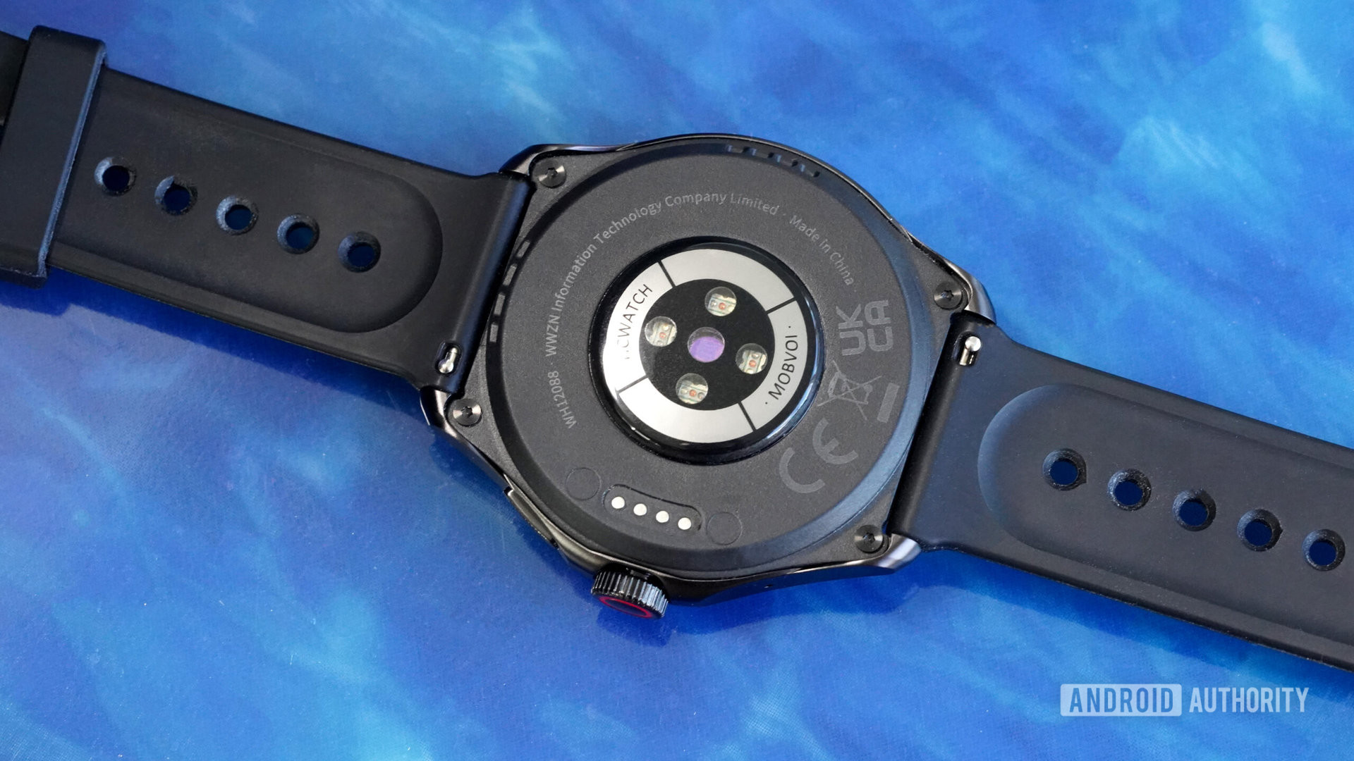 A Mobvoi TicWatch Pro 5 rests face down displaying its sensors package.