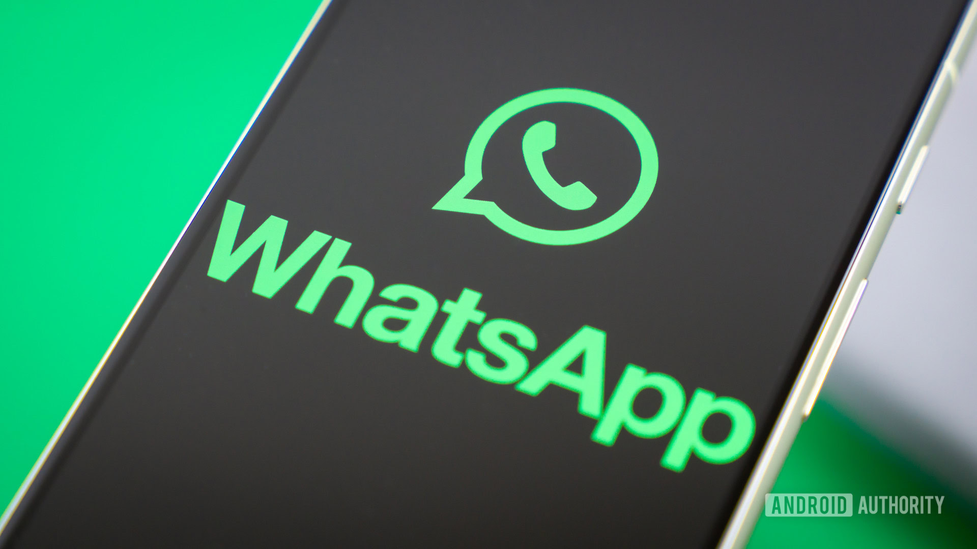 WhatsApp logo on smartphone next to everyday accessories Stock photo 4