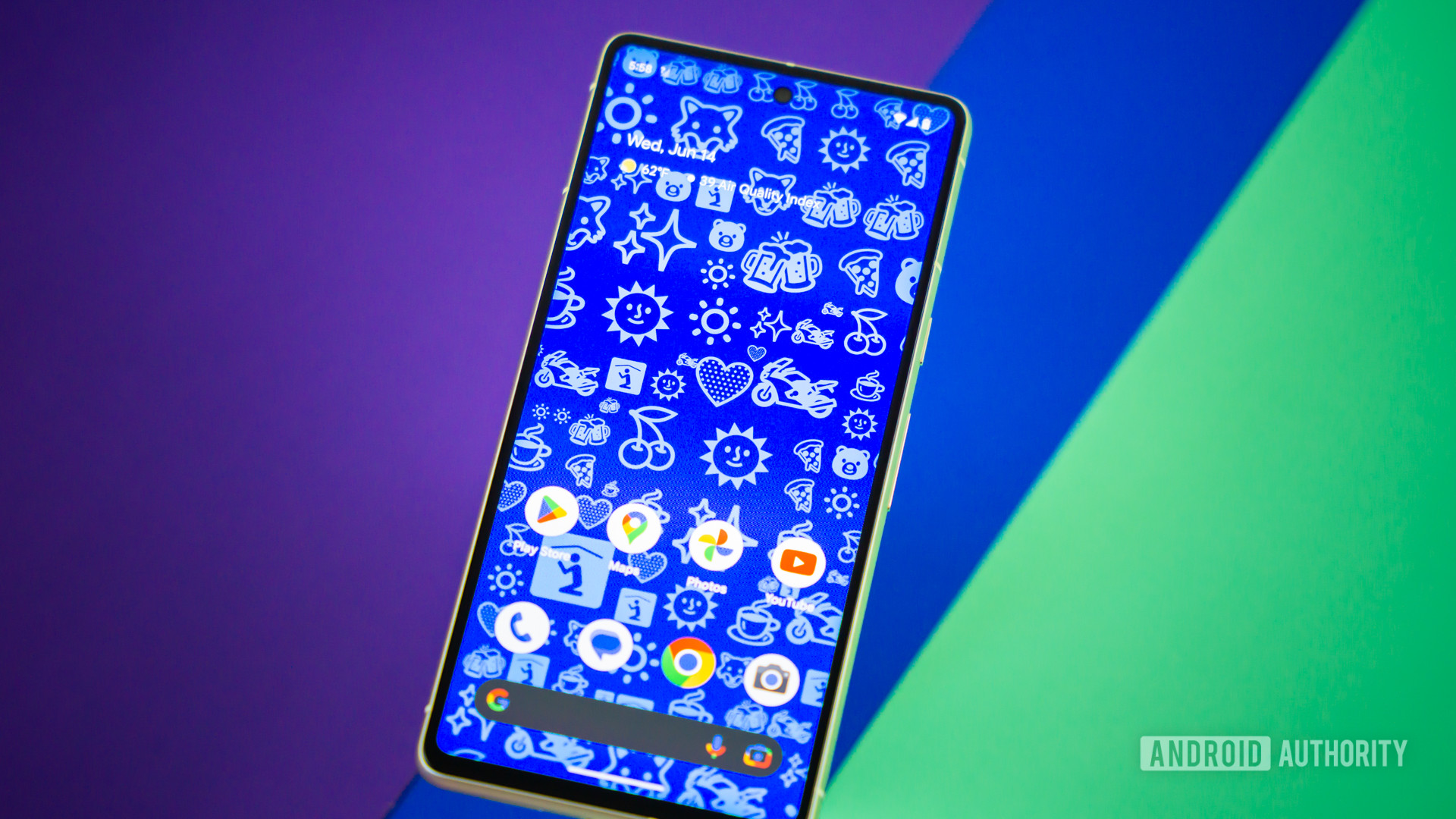 Android Emoji wallpapers on Android phone stock photo 1