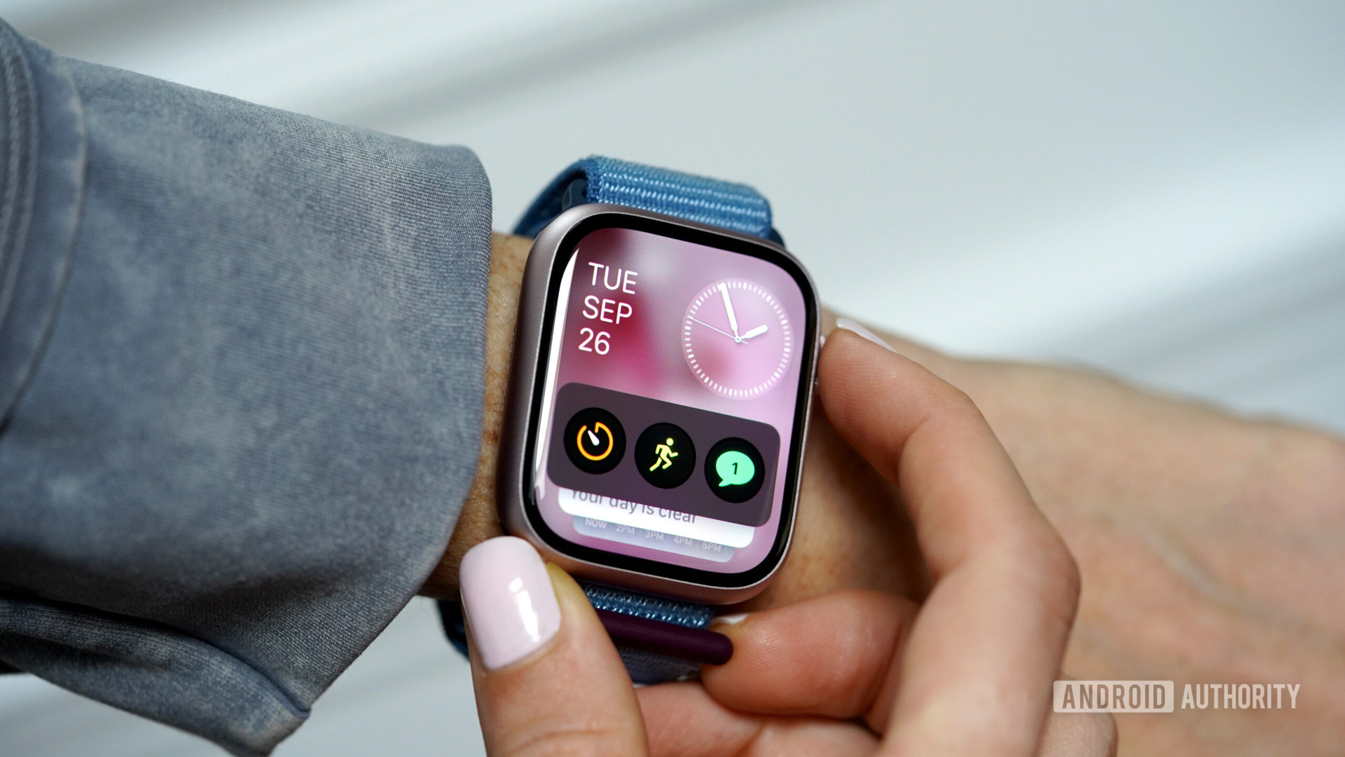 A user reviews her Smart Stack on her Apple Watch Series 9.