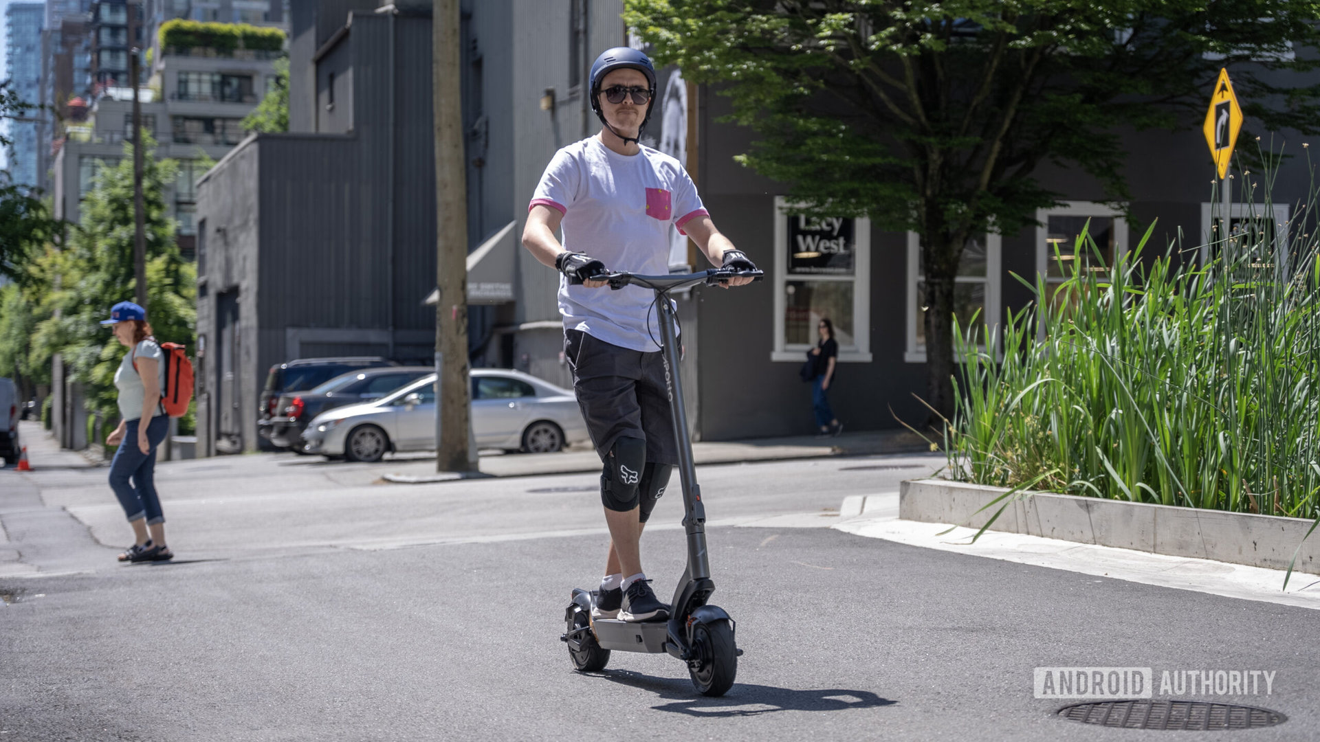 Riding Apollo City electric scooter