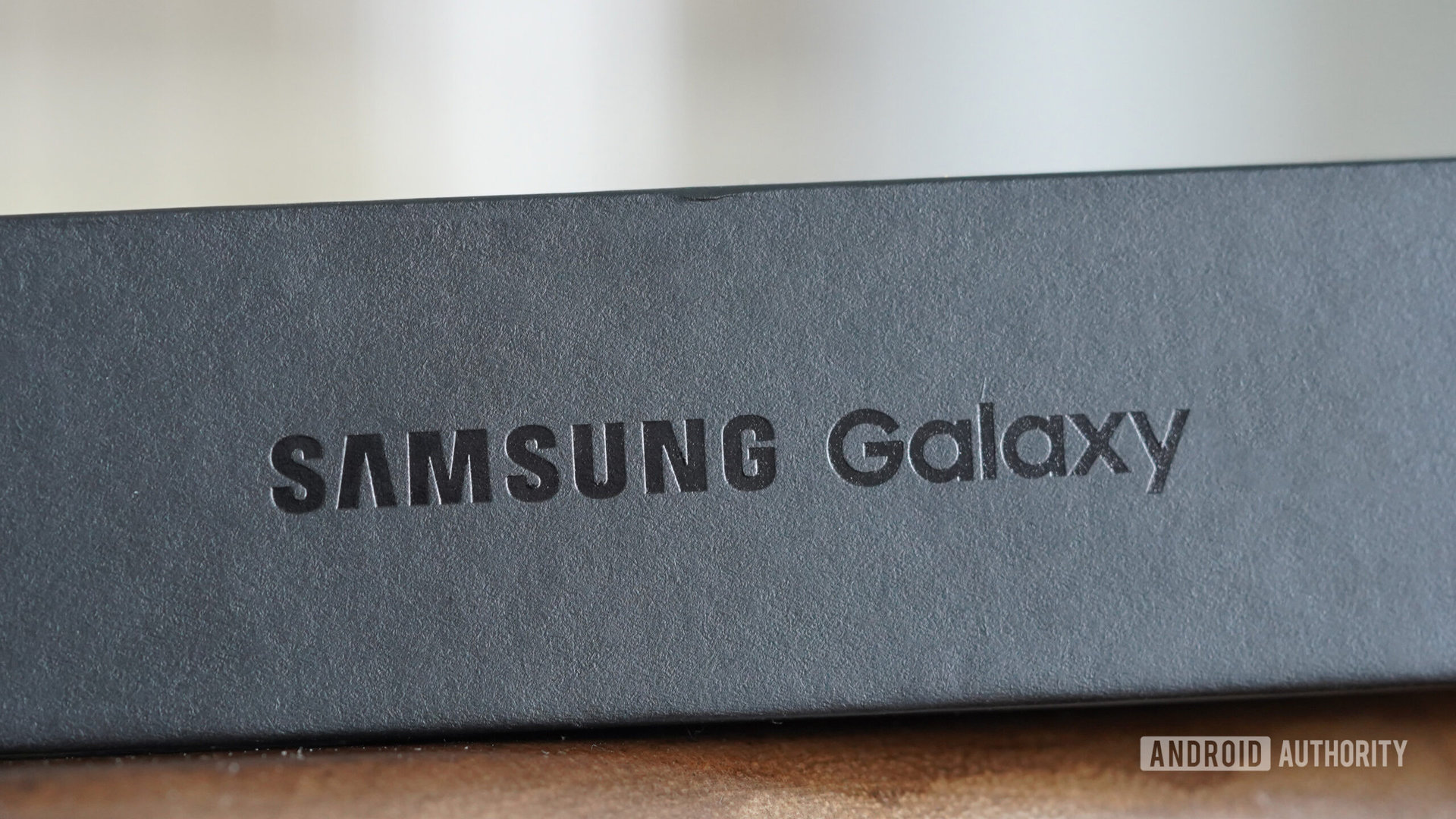 A box with the Samsung logo rests on a table.