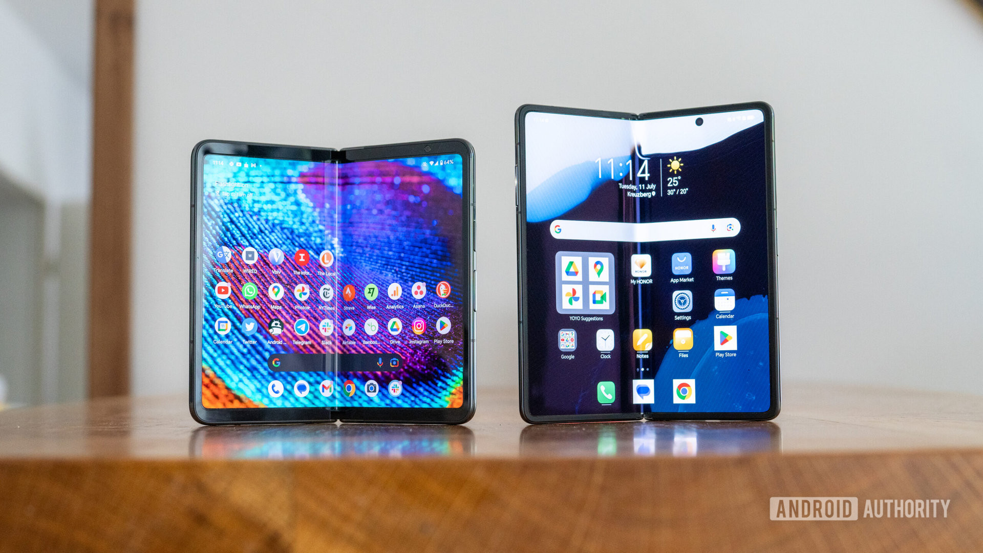 Honor Magic V2 Ultimate vs Google Pixel Fold showing home screens on table