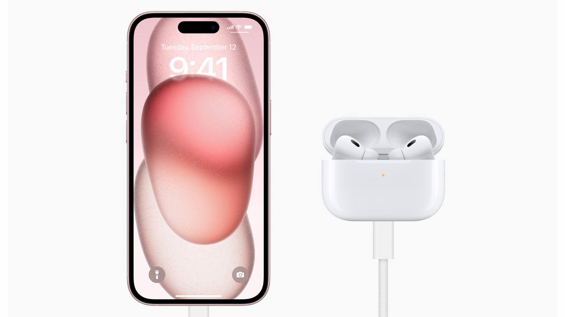 An iPhone 15 plugged into AirPods Pro