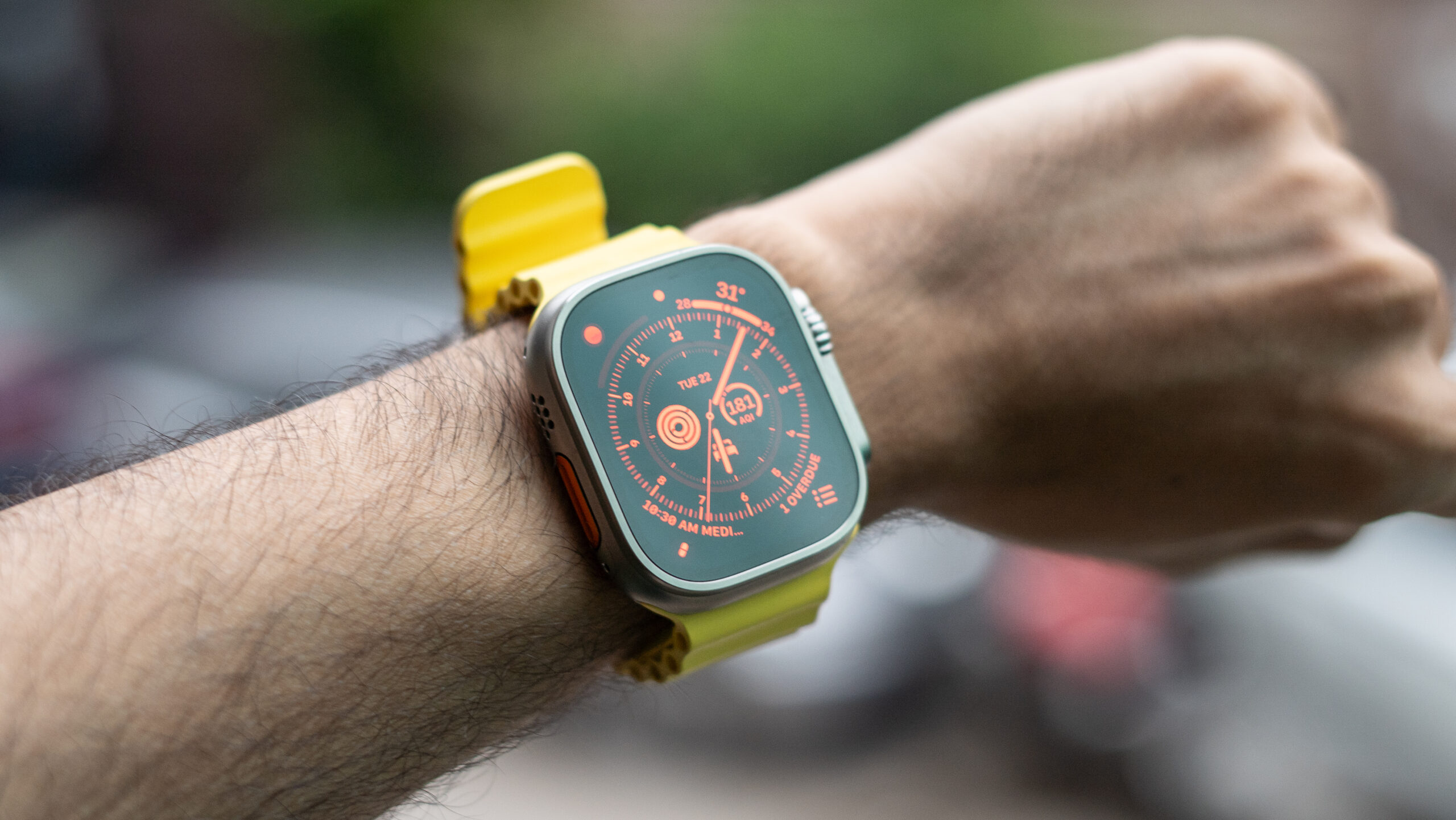Apple Watch Ultra with Wayfinder watchface on wrist close up