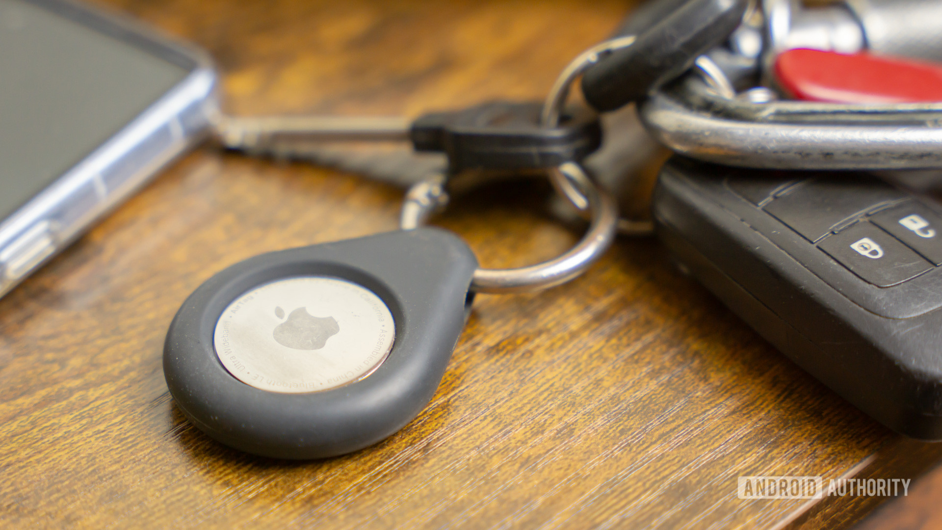 Apple AirTag on keychain stock photo