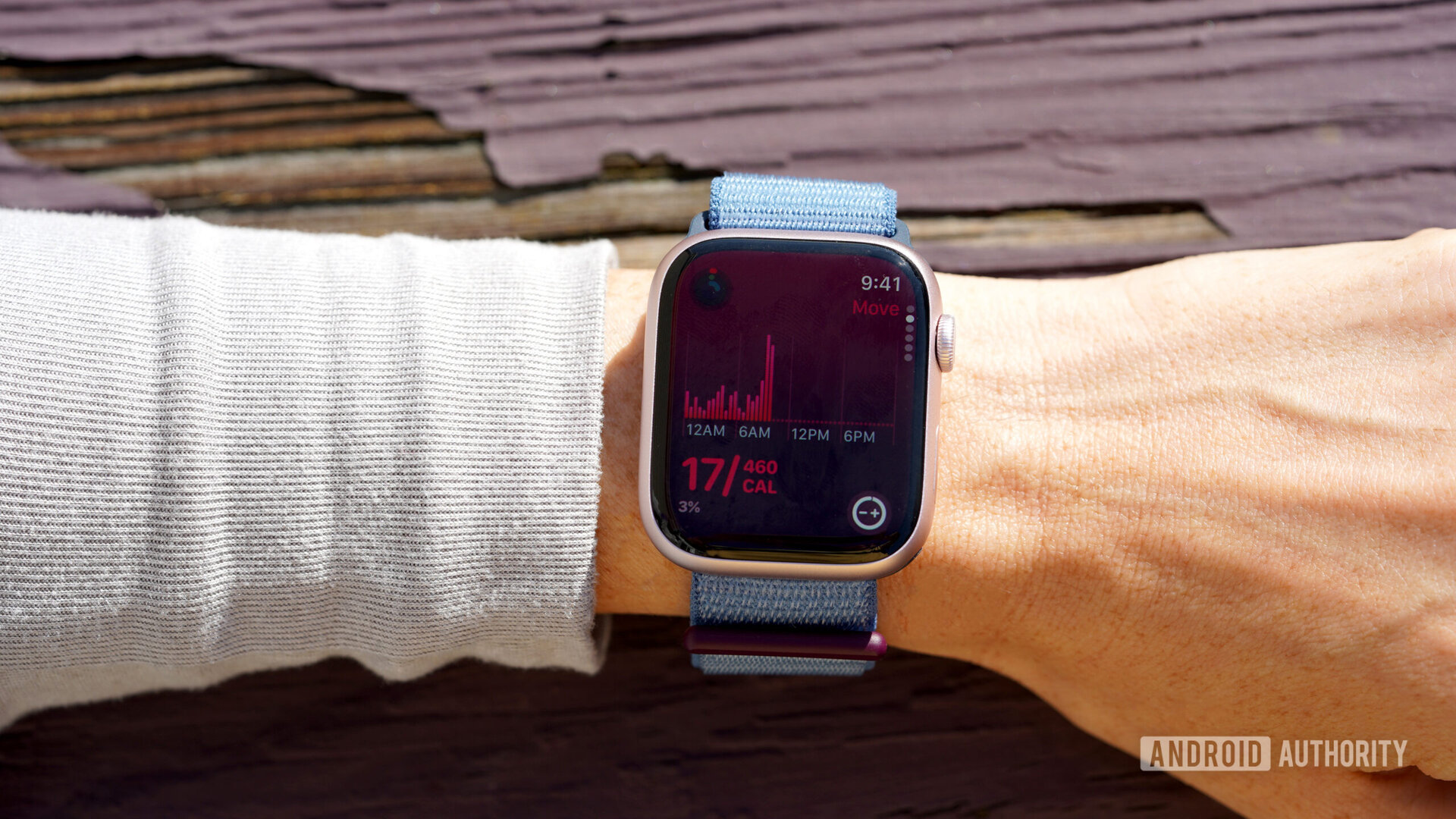 An Apple Watch Series 9 on a users wrists displays their Move stats.