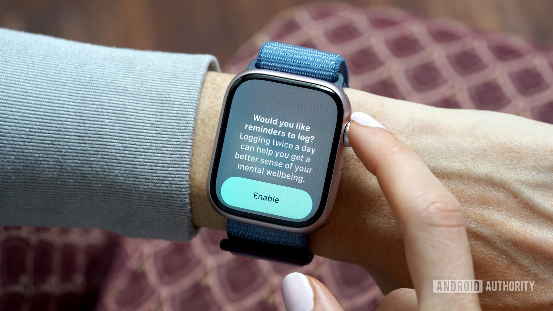 A user enables daily reminders to log their mental state on the Apple Watch Series 9.