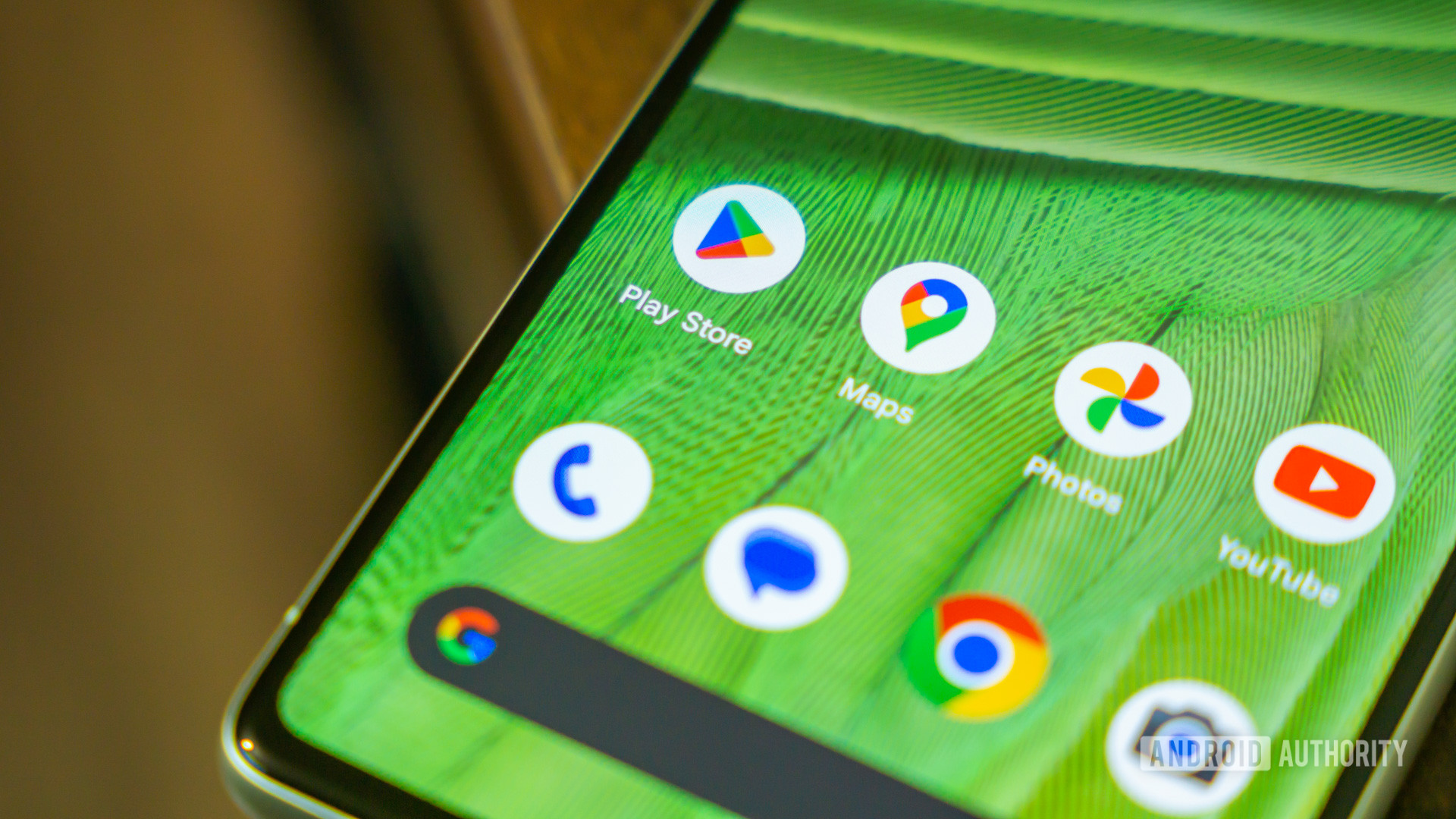 Google Play Store app next to other Google Apps stock photo
