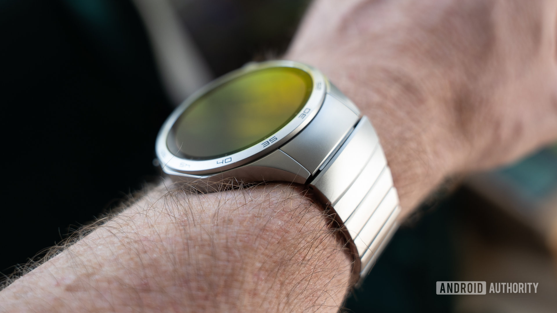 Huawei Watch GT 4 smartwatch on wrist showing integrated bracelet lug design
