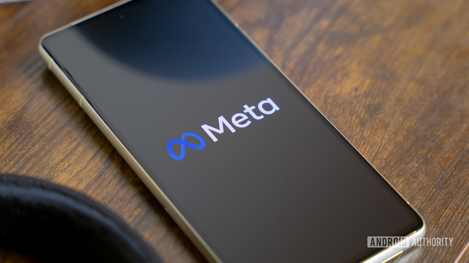 Meta logo on smartphone stock photo (13)