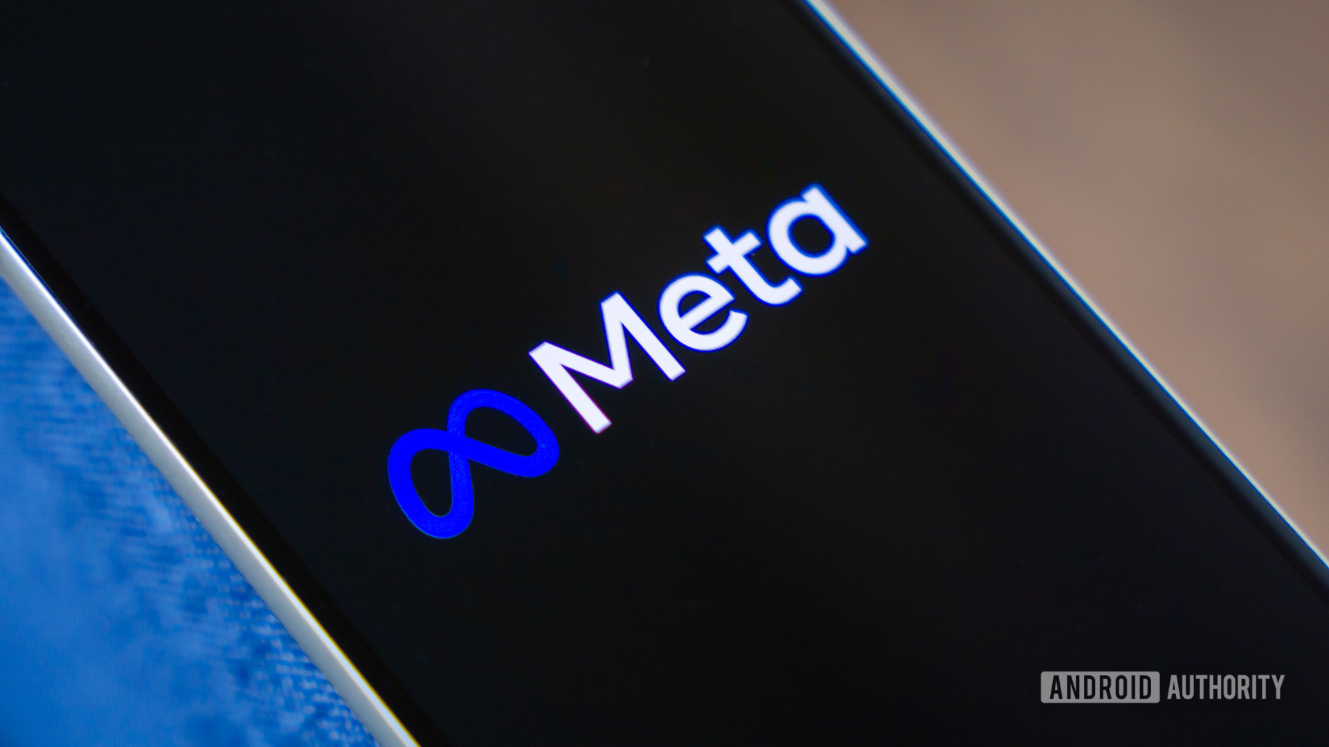 Meta logo on smartphone stock photo (6)