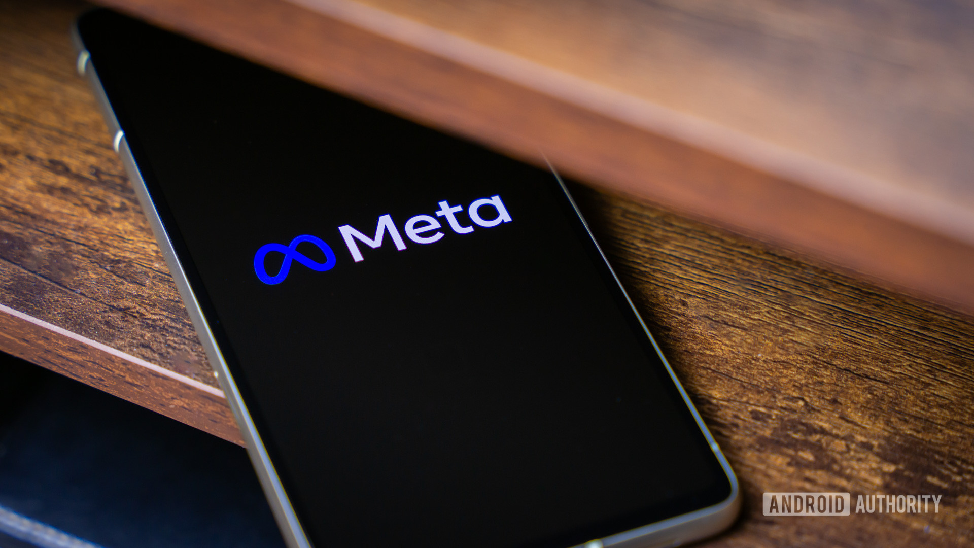 Meta logo on smartphone stock photo (8)