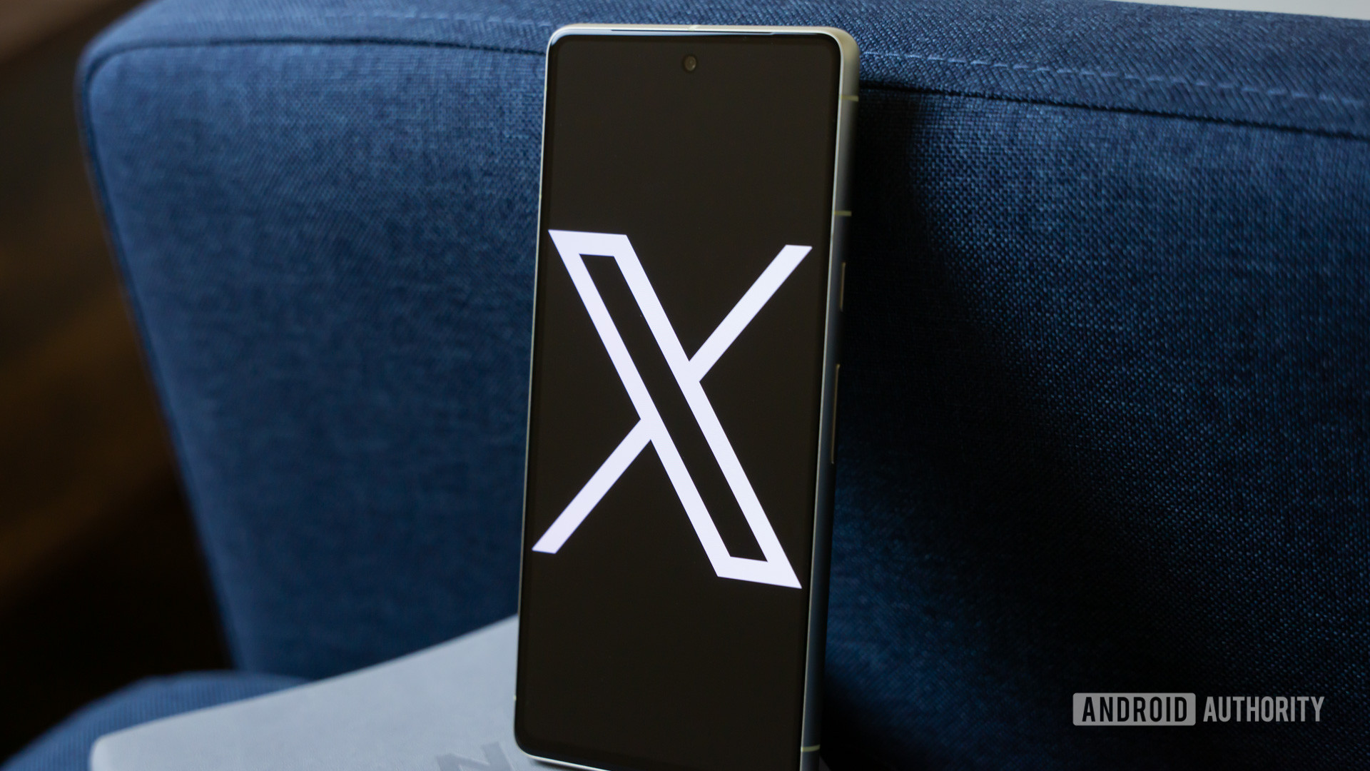 X logo on smartphone stock photo (aka Twitter) (1)