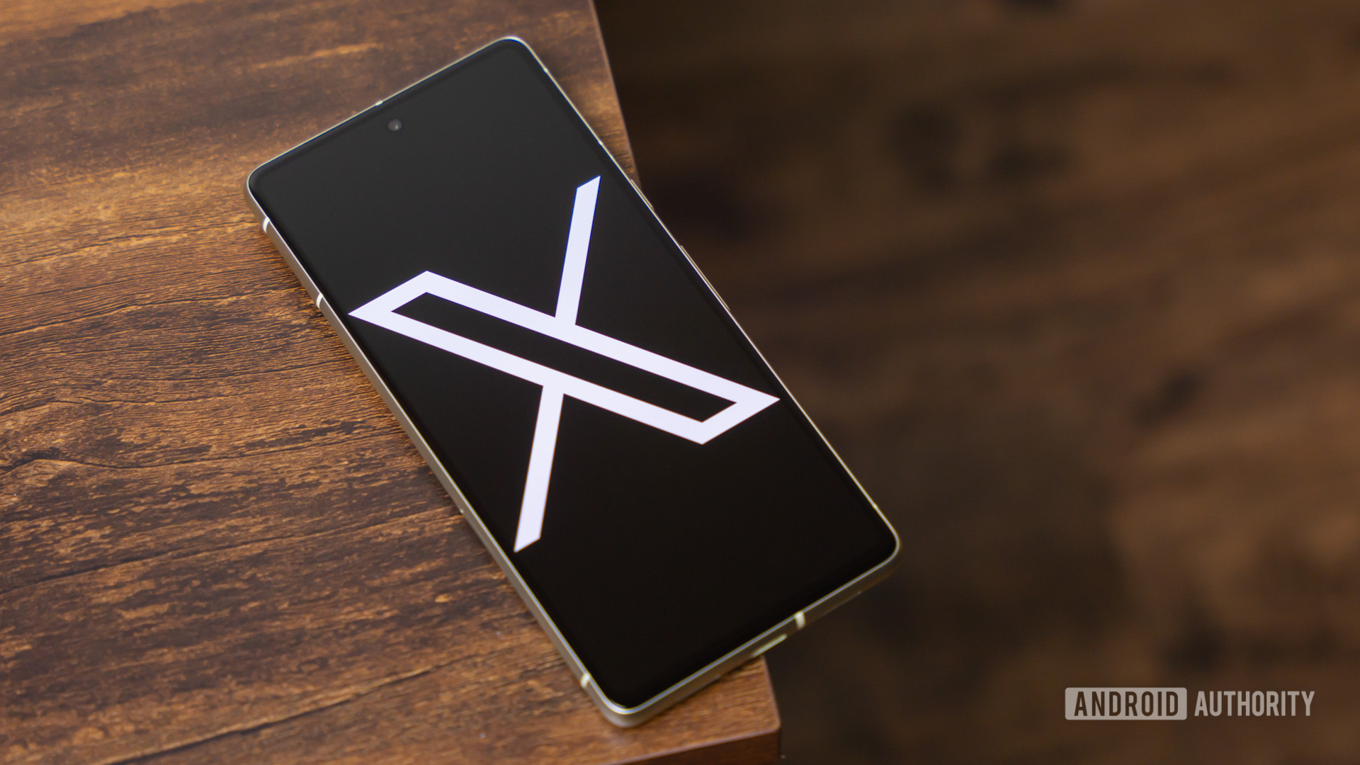 X logo on smartphone stock photo (aka Twitter) (3)