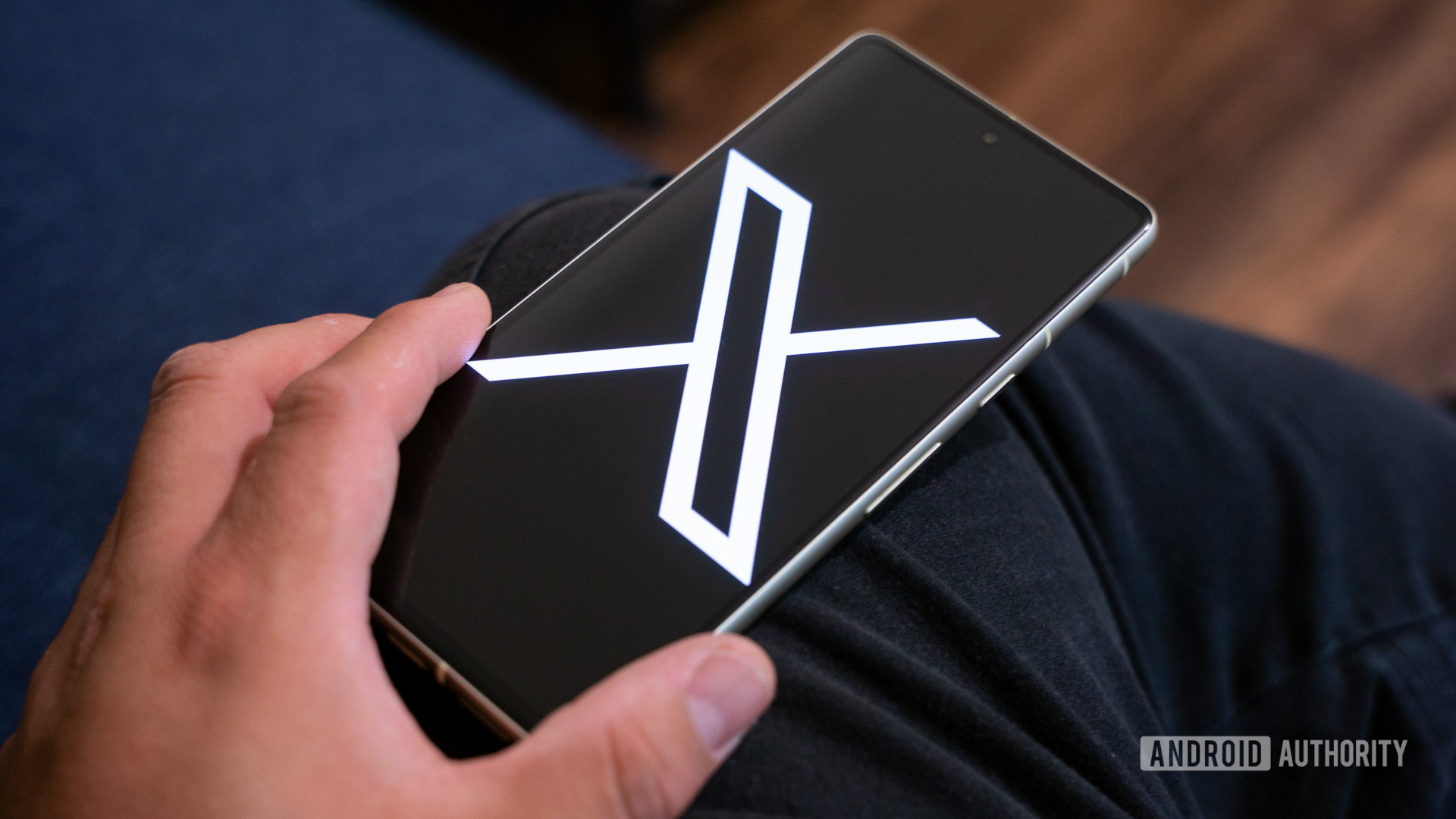 X logo on smartphone stock photo (aka Twitter) (4)