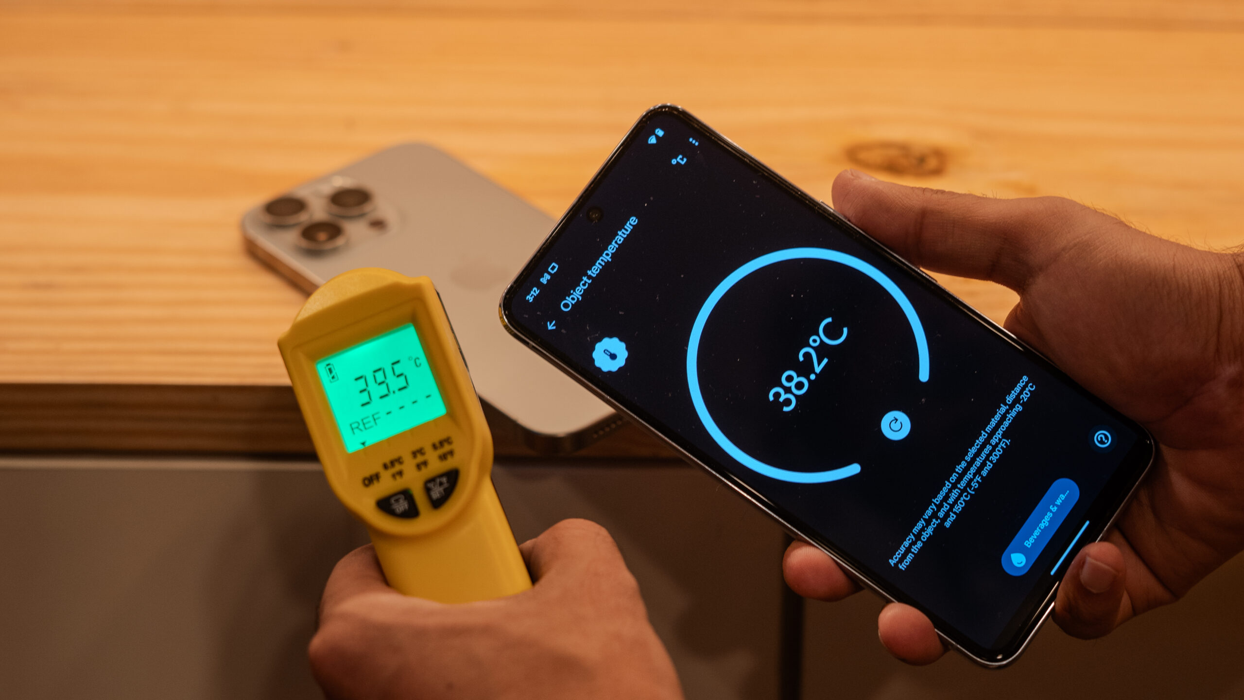 Pixel 8 Pro vs Stanley IR Thermometer measuring iPhone 15 Pro Max temperature