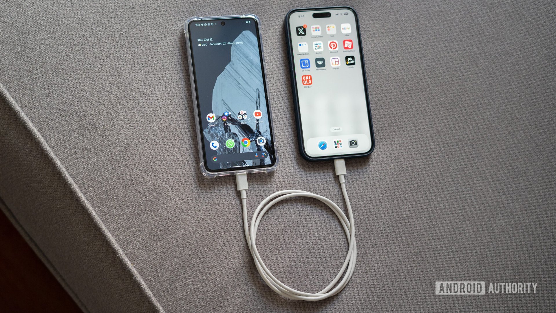 Pixel 8 Pro vs iPhone 15 Pro Max connected over USB top down view