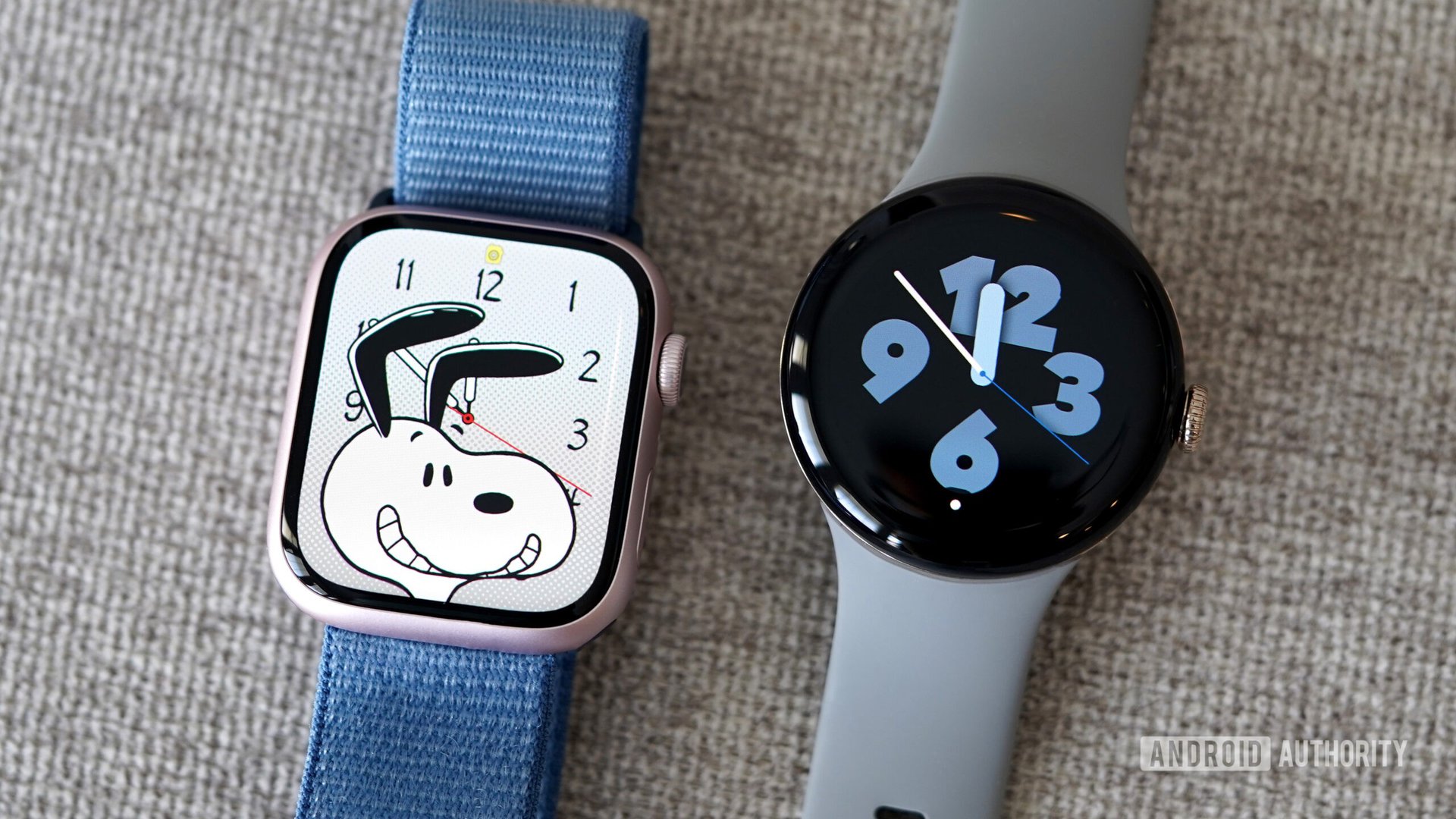 A Pixel Watch 2 rest alongside an Apple Watch Series 9.