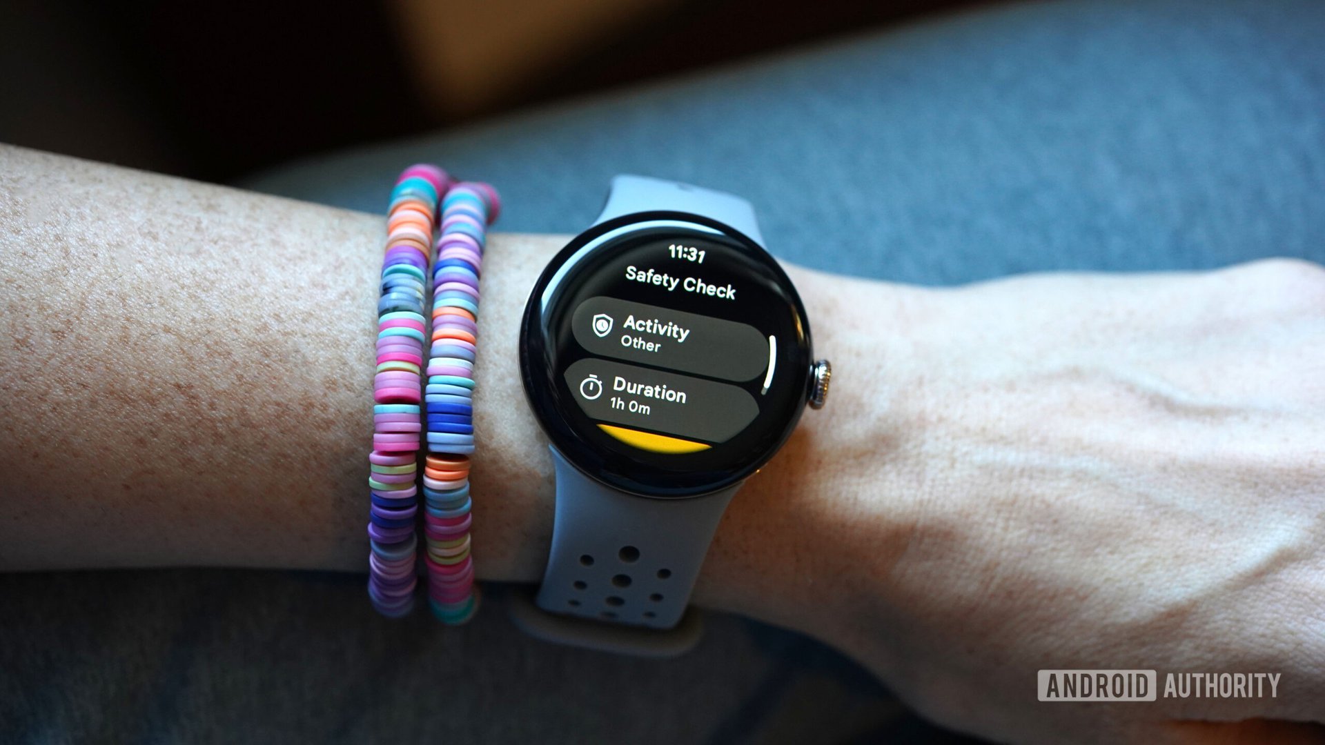 A user begins a Safety Check session on her Pixel Watch 2.