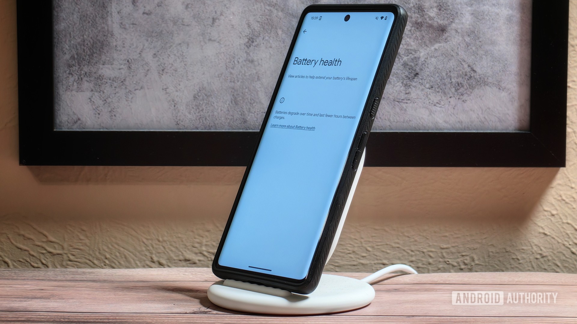Battery health page on a Pixel 7 Pro charging on a Pixel Stand