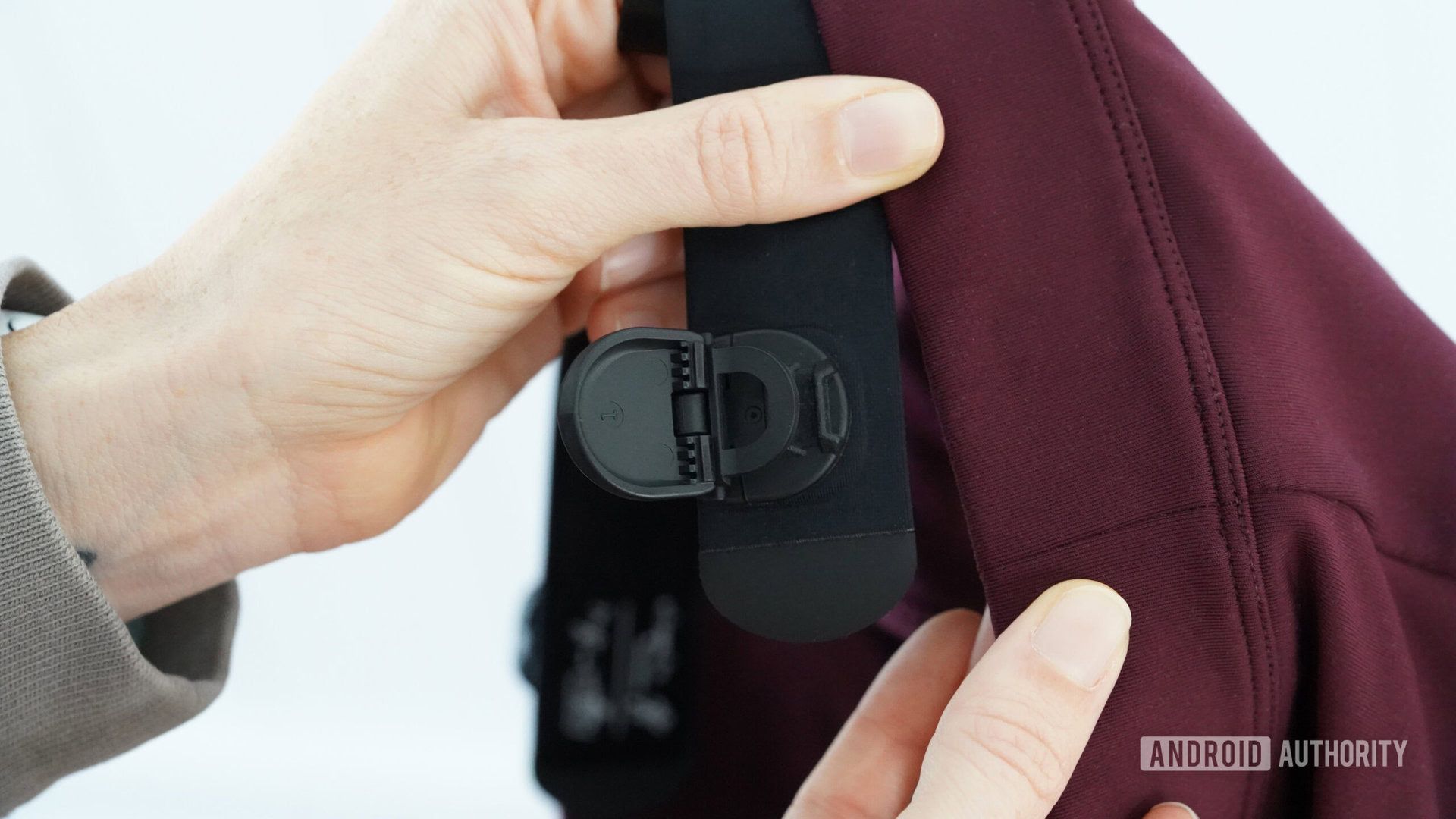 A Garmin HRM Fit user highlights how to attach the device to a sports bra.