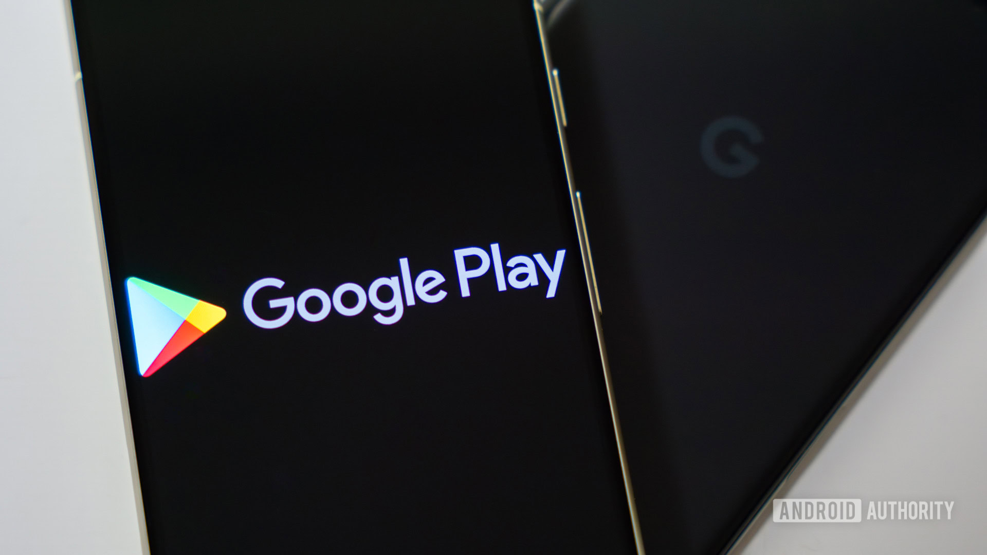 Google Play Store logo on smartphone stock photo (4)