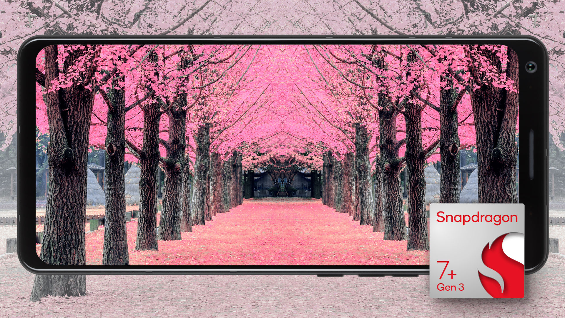 Un teléfono Snapdragon 7 Plus Gen 3 tomando una fotografía de árboles rosados.