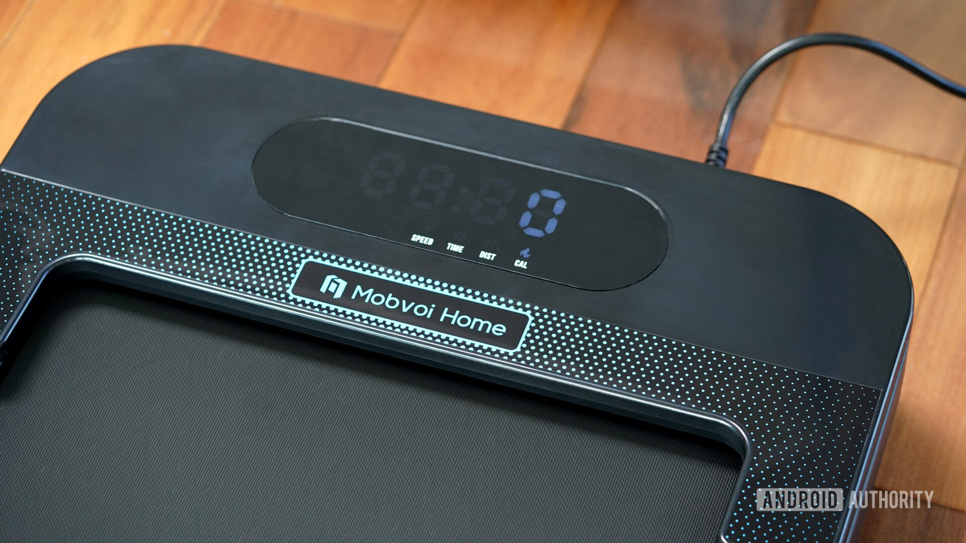 The screen of a Mobvoi Home Walking Treadmill displays users real time stats.