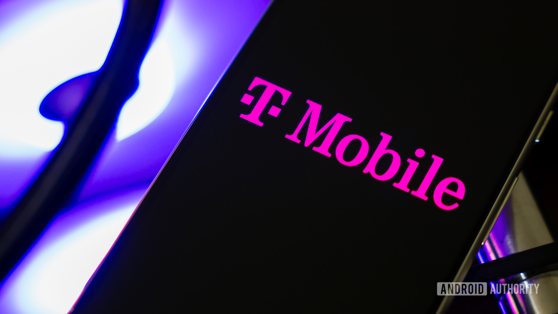 Logotipo de T Mobile en el teléfono inteligente (3)